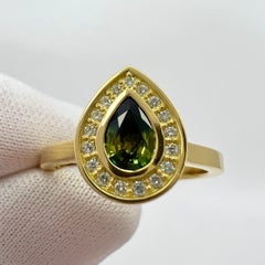 Anello aureolato in oro giallo 18 carati con zaffiro bicolore e diamante certificati IGI