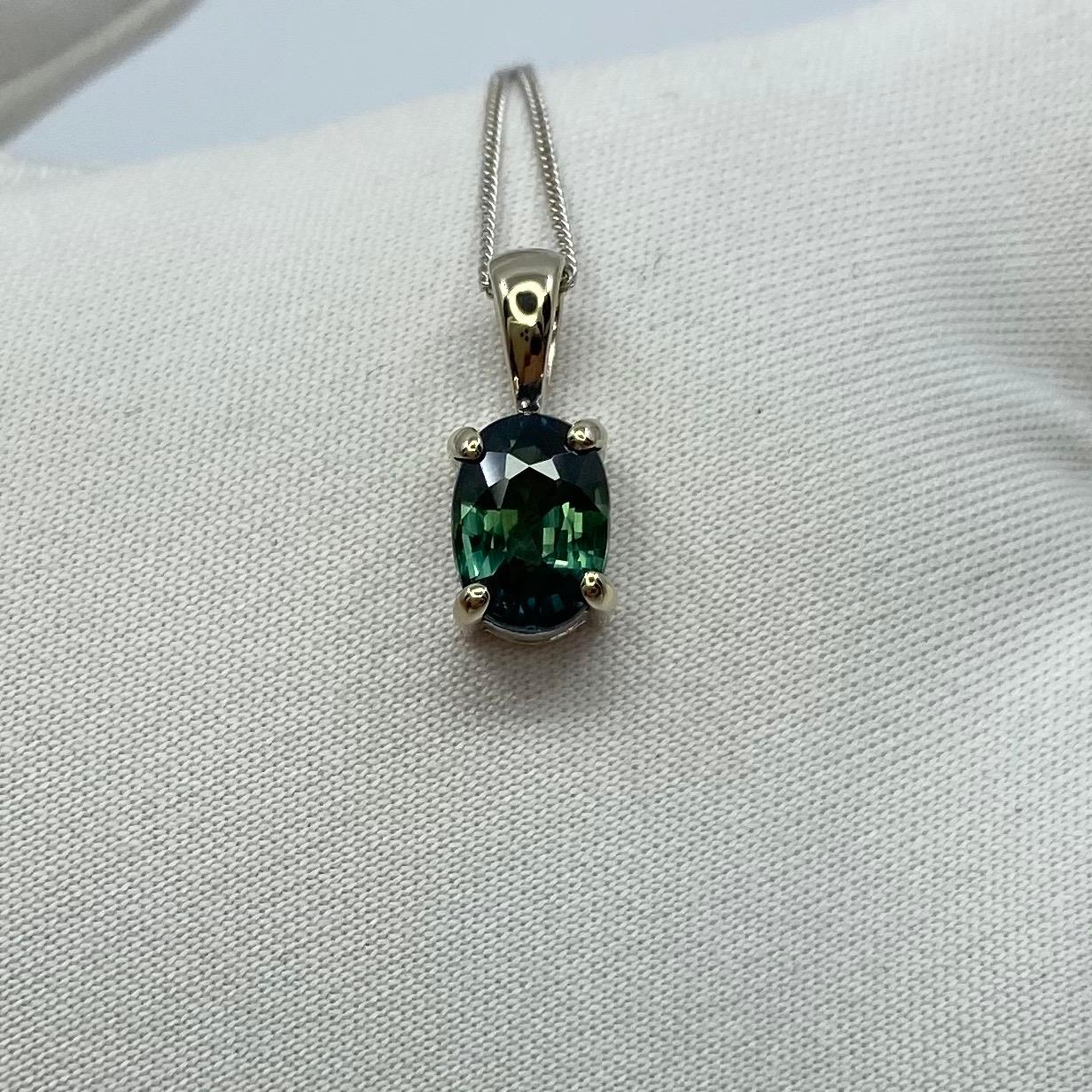 IGI Certified Untreated Bi-Colour Sapphire Pendant Necklace

1.18 Carat sapphire with rare bi-colour effect. Showing hues of green and blue, very rare and stunning to see. Also has excellent clarity, very clean stone with an an excellent oval