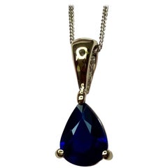 IGI Certified Untreated Blue Sapphire Pear Cut Solitaire 18 Karat Gold Pendant