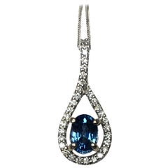 IGI Certified Untreated Ceylon Blue Sapphire and Diamond Gold Crossover Pendant