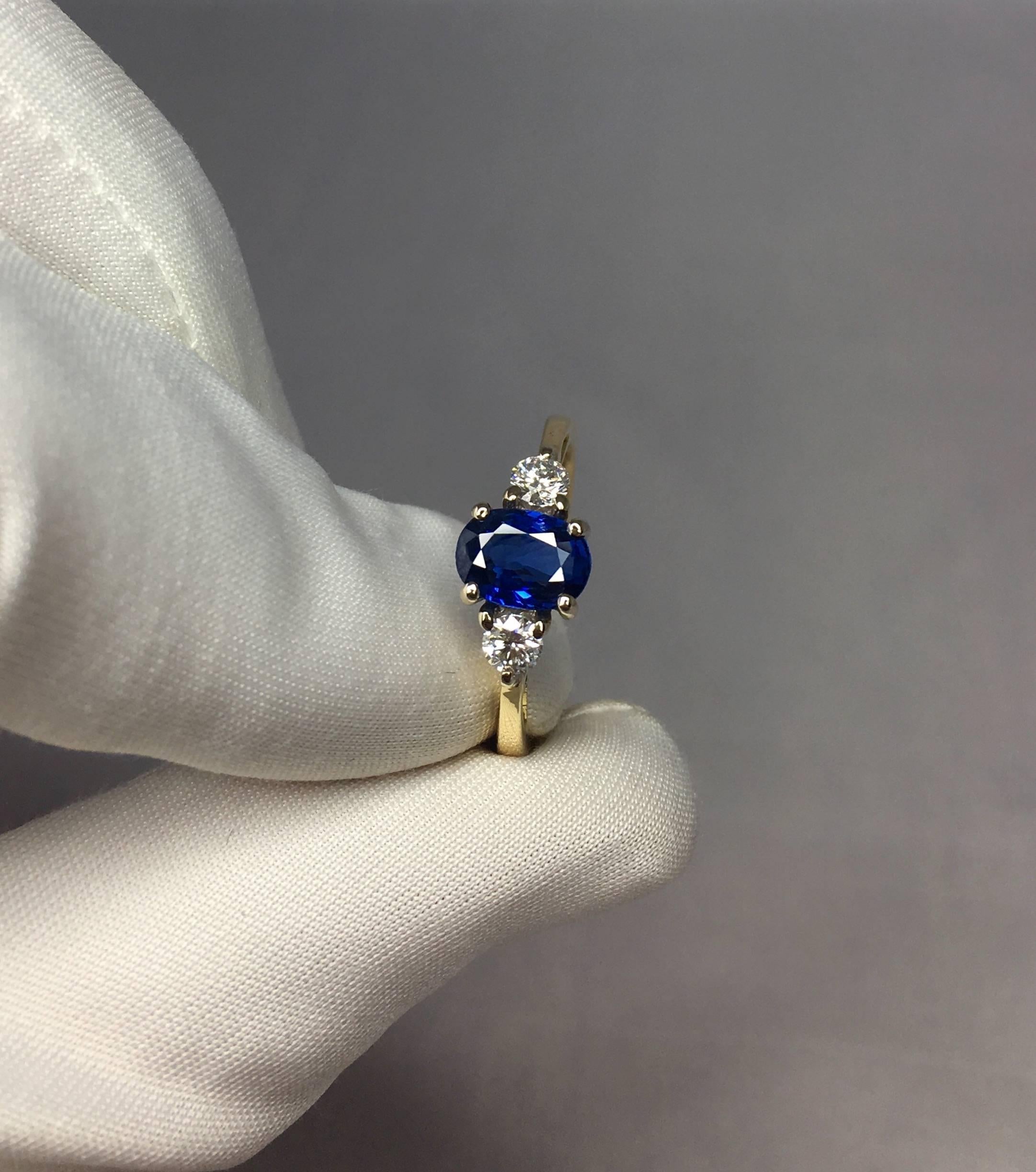 Stunning natural deep blue Ceylon sapphire set in a fine 18k gold ring. White gold claw heads and a yellow gold band.

1.00 carat centre sapphire with a fine deep blue colour and excellent clarity. 

Totally untreated and unheated, comes with full