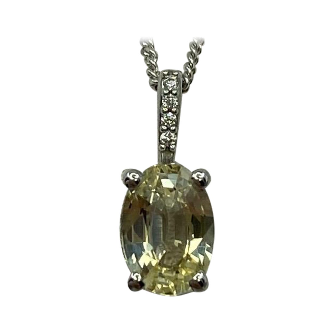 Colgante de oro blanco de 18k con diamante zafiro amarillo de Ceilán sin tratar certificado por el IGI