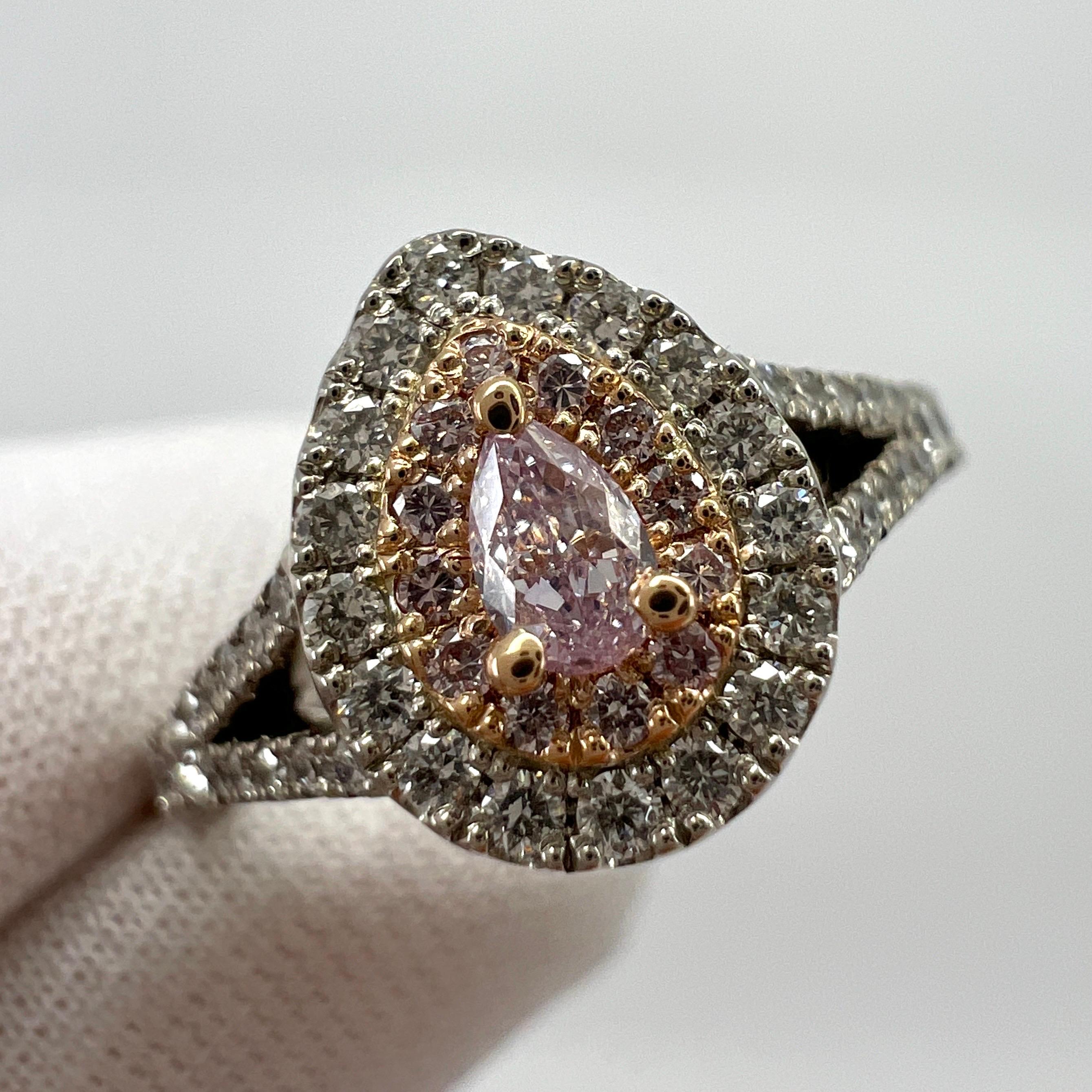 Fine Untreated Fancy Light Pink Diamond 18k Rose And White Gold Cluster Halo Ring.

Beautifully designed ring featuring an IGI certified 0.10 carat natural fancy light pink colour diamond.
A unique and rare colour diamond with an excellent pear cut