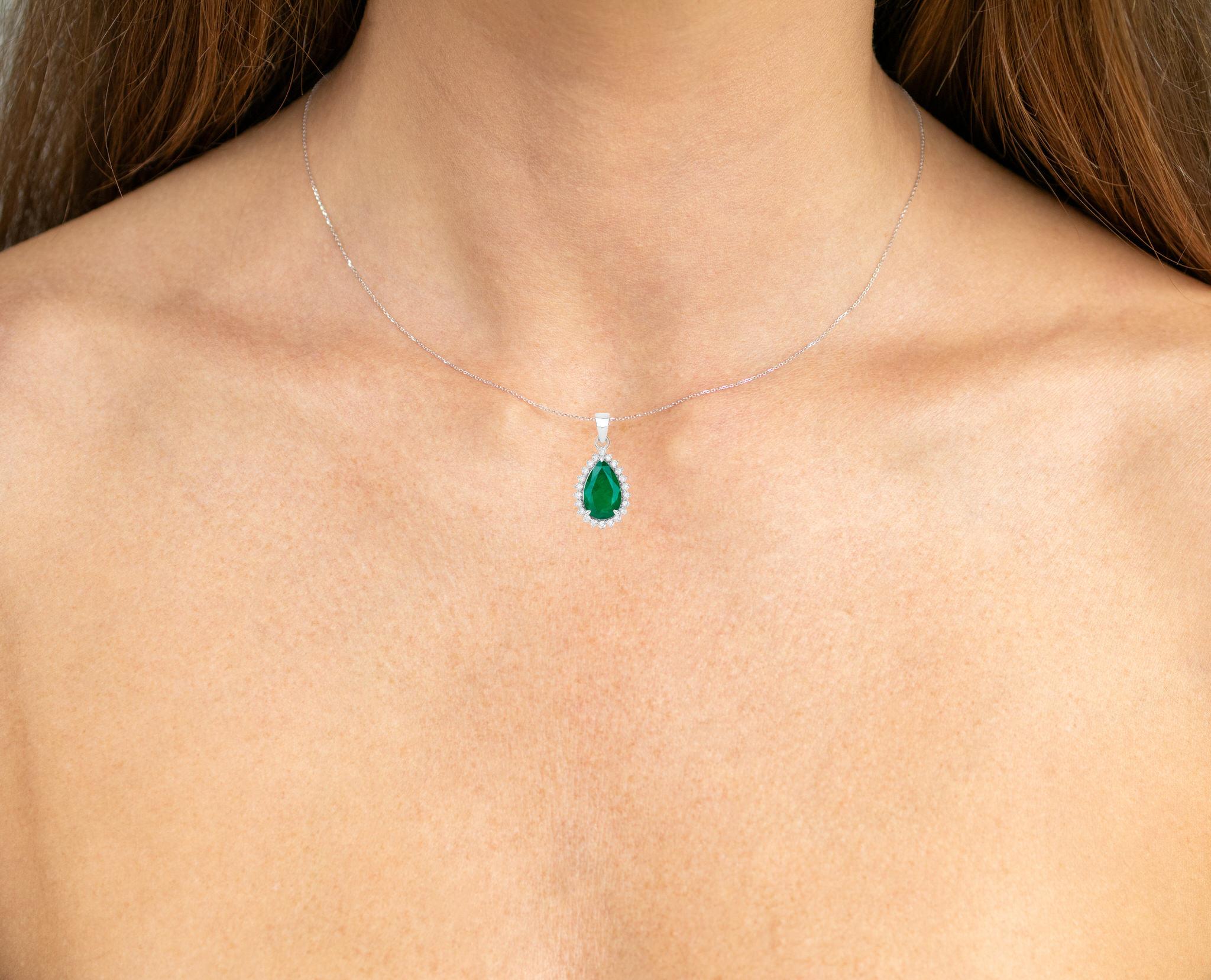 It comes with the IGI Certificate
All Gemstones are Natural
Zambian Emerald = 2.76 Carat
22 Diamonds = 0.31 Carats
Metal: 14K White Gold
Pendant Dimensions: 23 x 12 mm