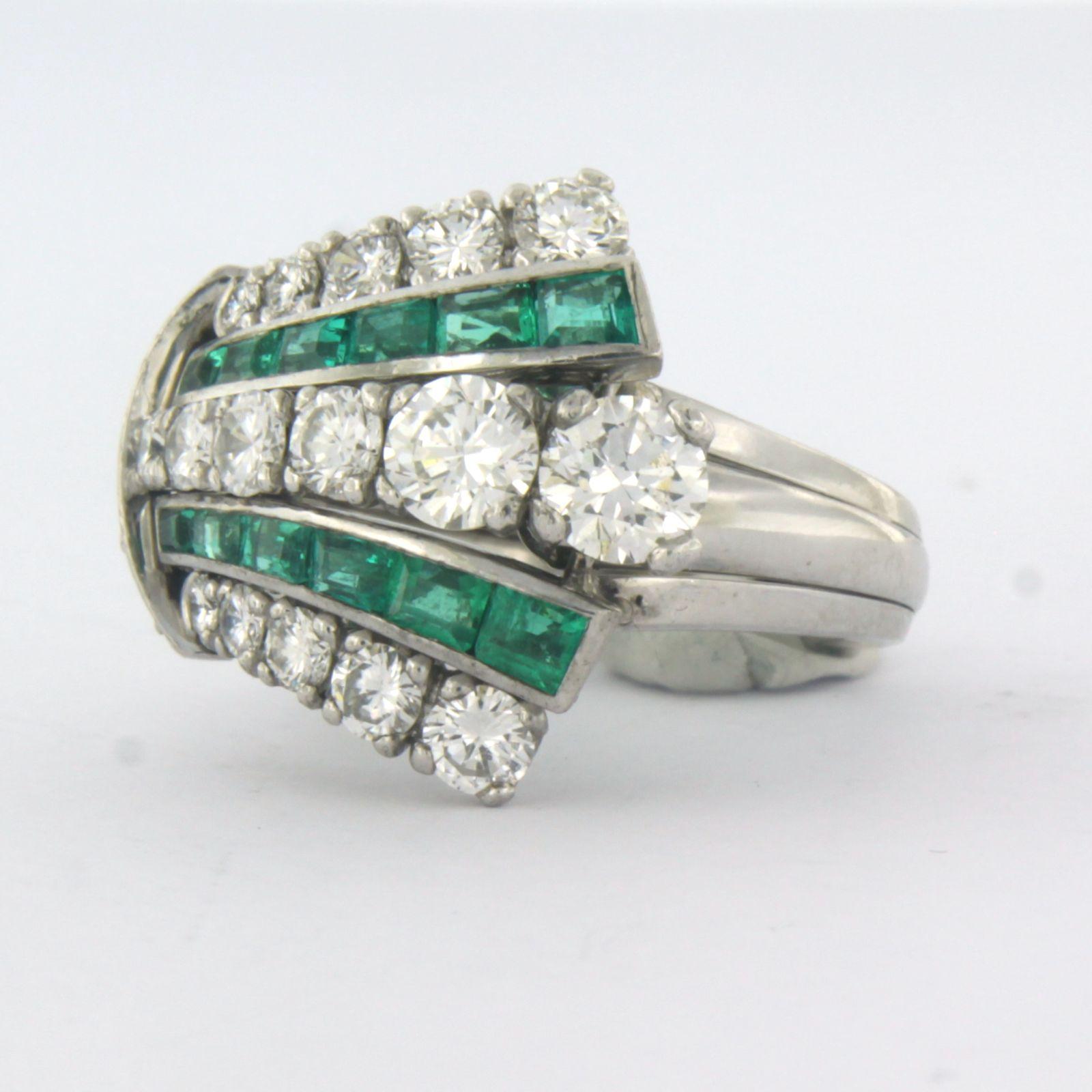 IGI Diamond Report - 18k white gold cocktail ring set with emerald and brilliant cut diamonds. 2.10ct – G, F/G – VS1, SI1, VS/SI - ring size US. 7 – EU 17.25(54)

detailed description:

The top of the ring is 2.0 cm wide by 9.7 mm high

Ring size