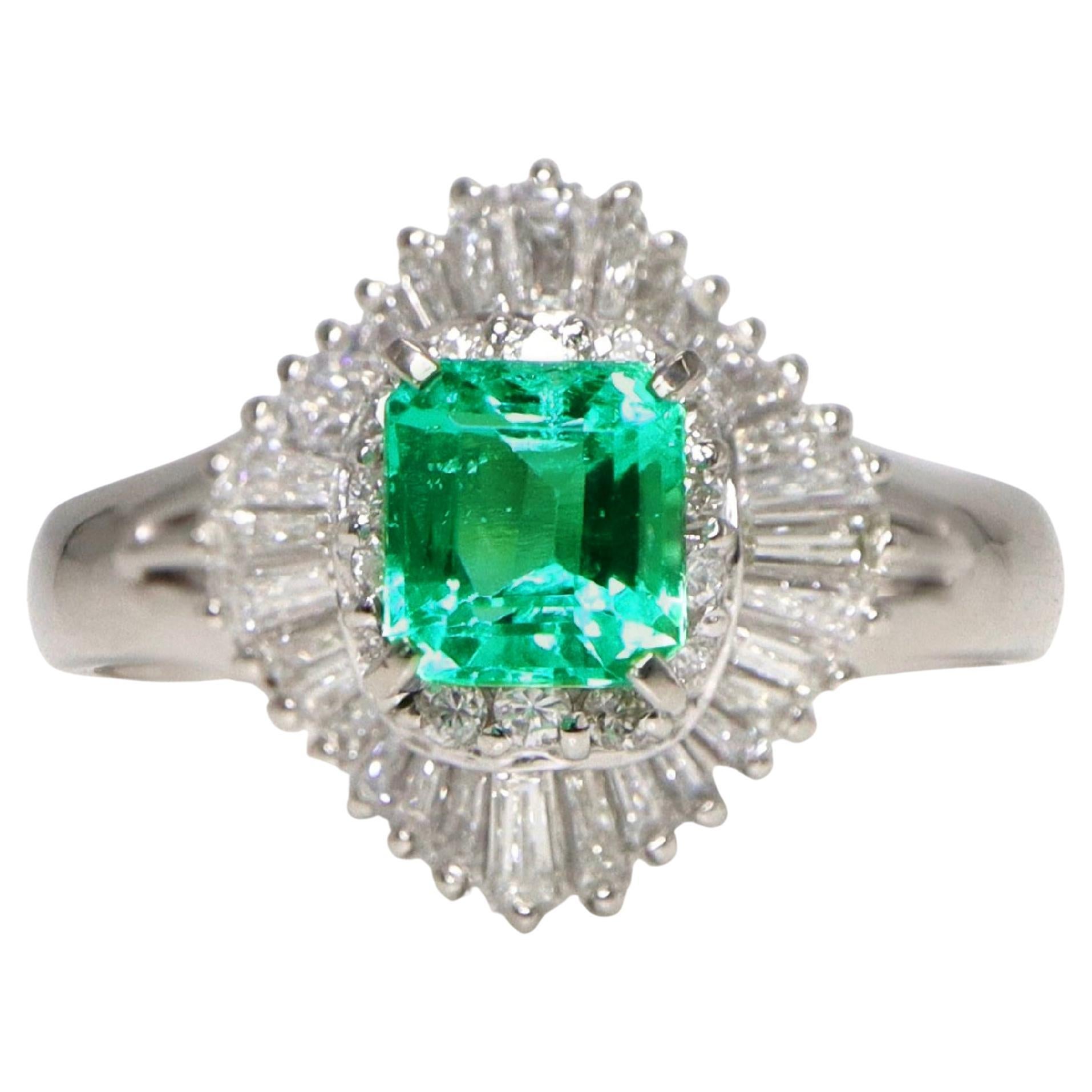 Anello di fidanzamento in platino IGI con smeraldo Colombia da 0.59 carati in stile antico Art Deco