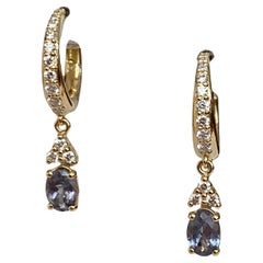 IGI Report Orecchini in oro giallo con alessandrite e diamanti da 0,92 carati Nature