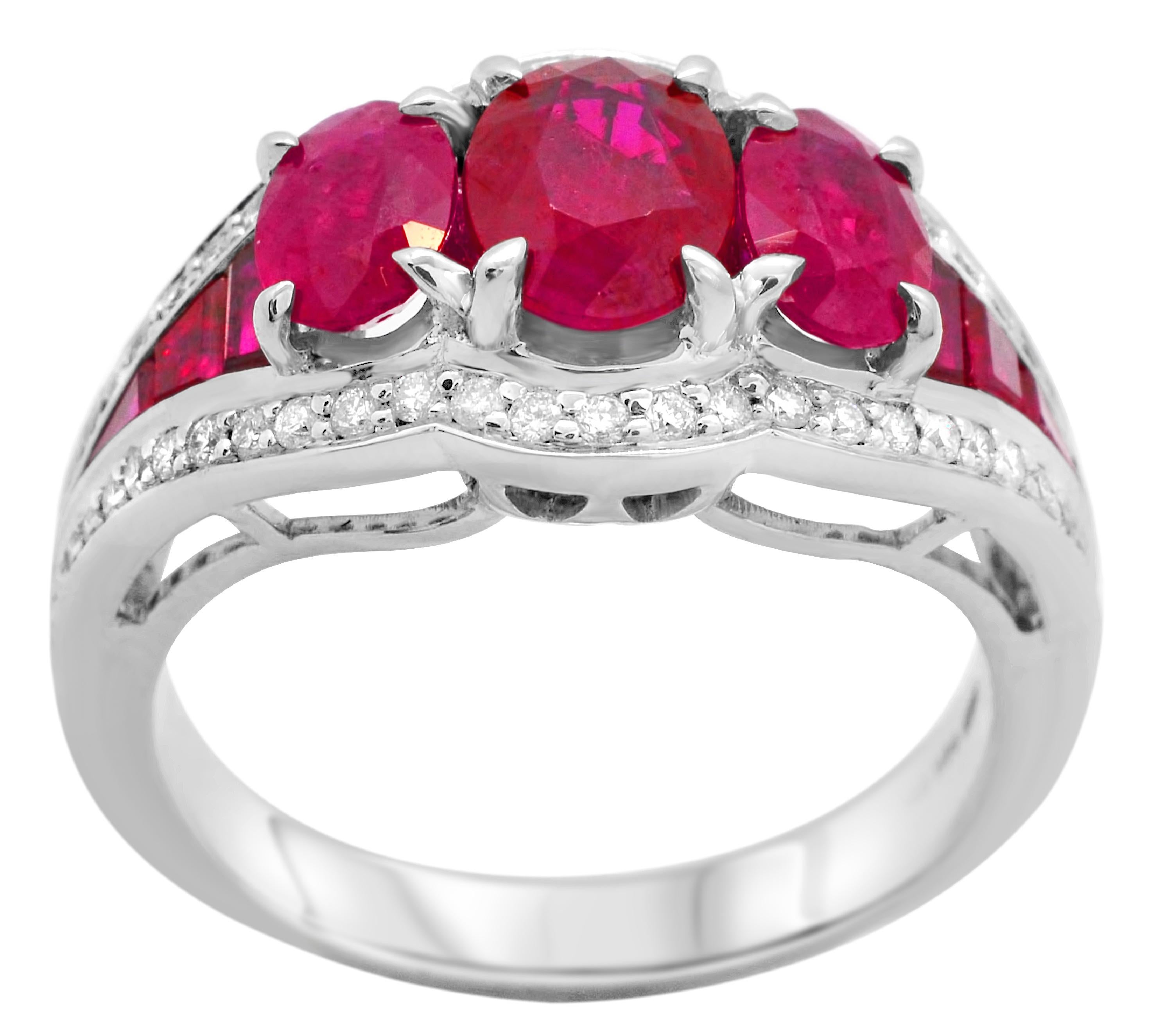 Contemporary 1.10 Carat Oval Three-stone Ruby Baguette Diamond 14Karat White Gold Ring For Sale