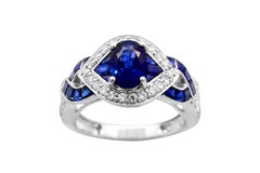1.10 Oval Sapphire Openwork 14Karat White Gold Criss Cross diamond band ring
