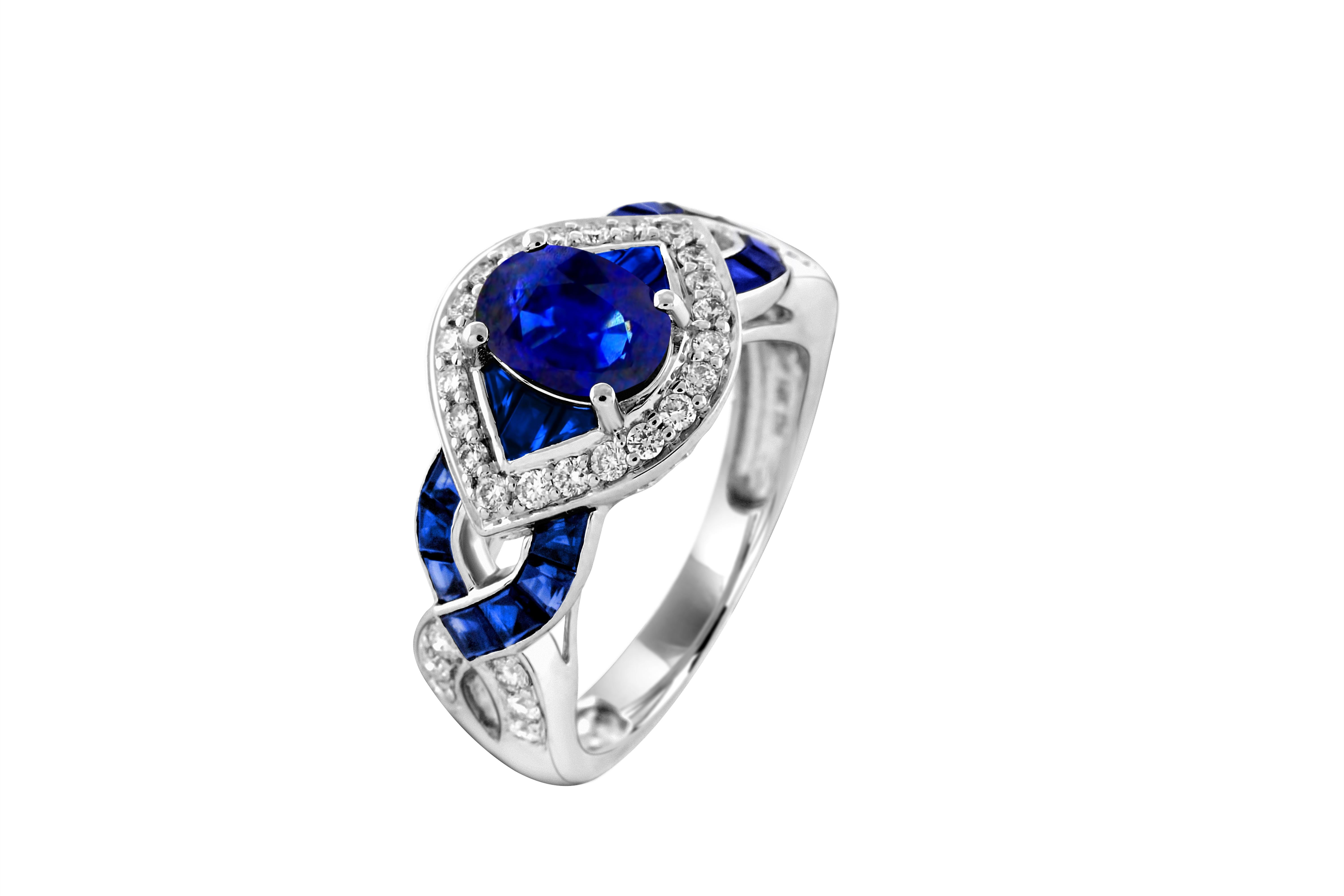 Contemporary 1.10 Oval Sapphire Openwork 14Karat White Gold Criss Cross diamond band ring For Sale