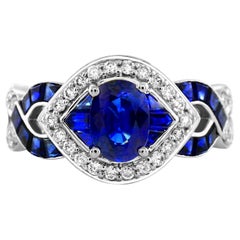 1.10 Oval Sapphire Openwork 14Karat White Gold Criss Cross diamond band ring