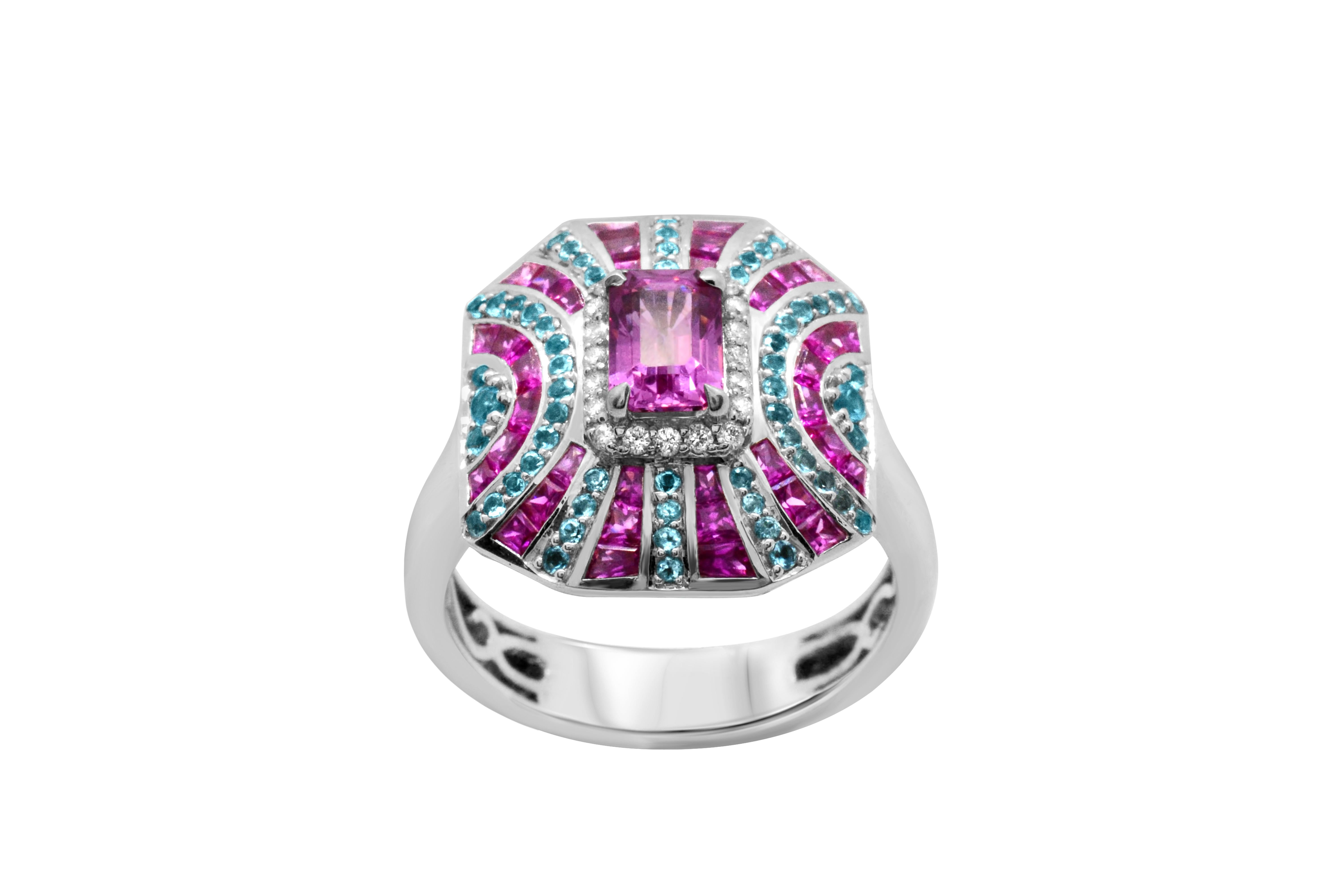 An art-deco inspired vivid Pink Sapphire ring.

This geometric design features a 1.61 carat Pink Sapphire that sits at the center.  There are also 1.05 carat baguette Pink Sapphires, 0.92 Princess-cut Pink Sapphires and a total of 58 blue topaz