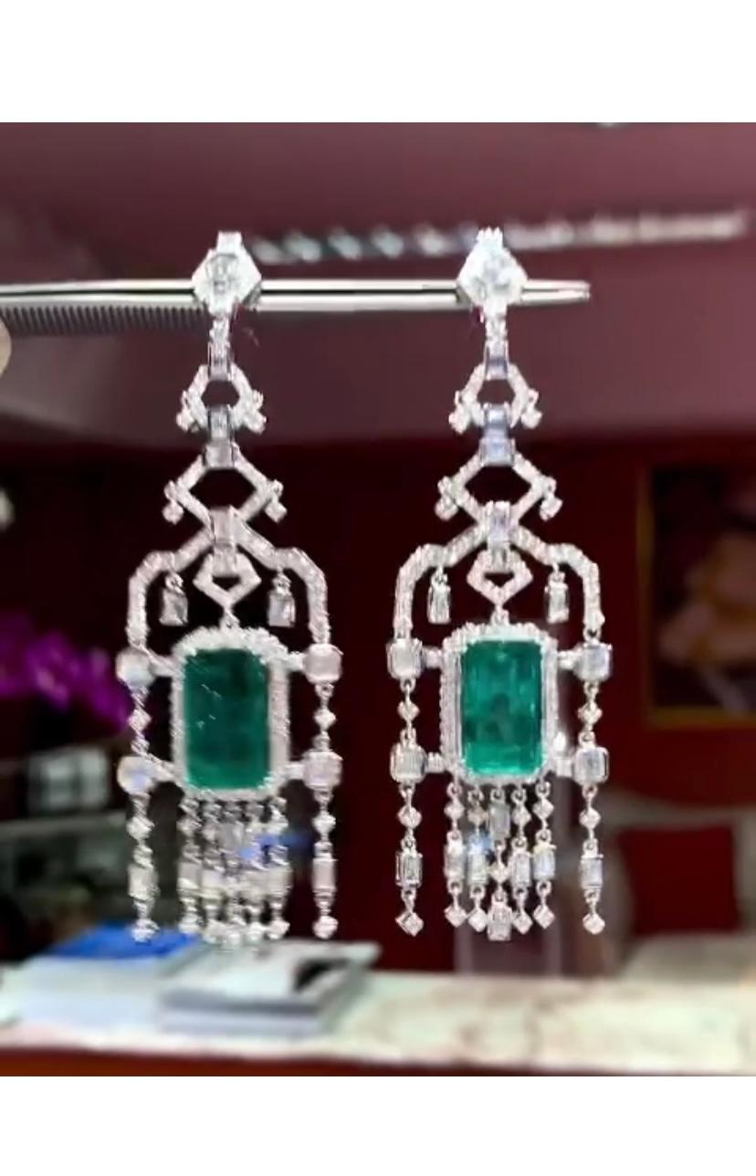 A stunning Art Deco design  pair of Zambian Emerald and Diamonds, an exquisite display of elegance. The cascading diamonds mimic a sparkling waterfall , gracefully complemented by delicate Emeralds.
This gorgeous combination creates a captivating