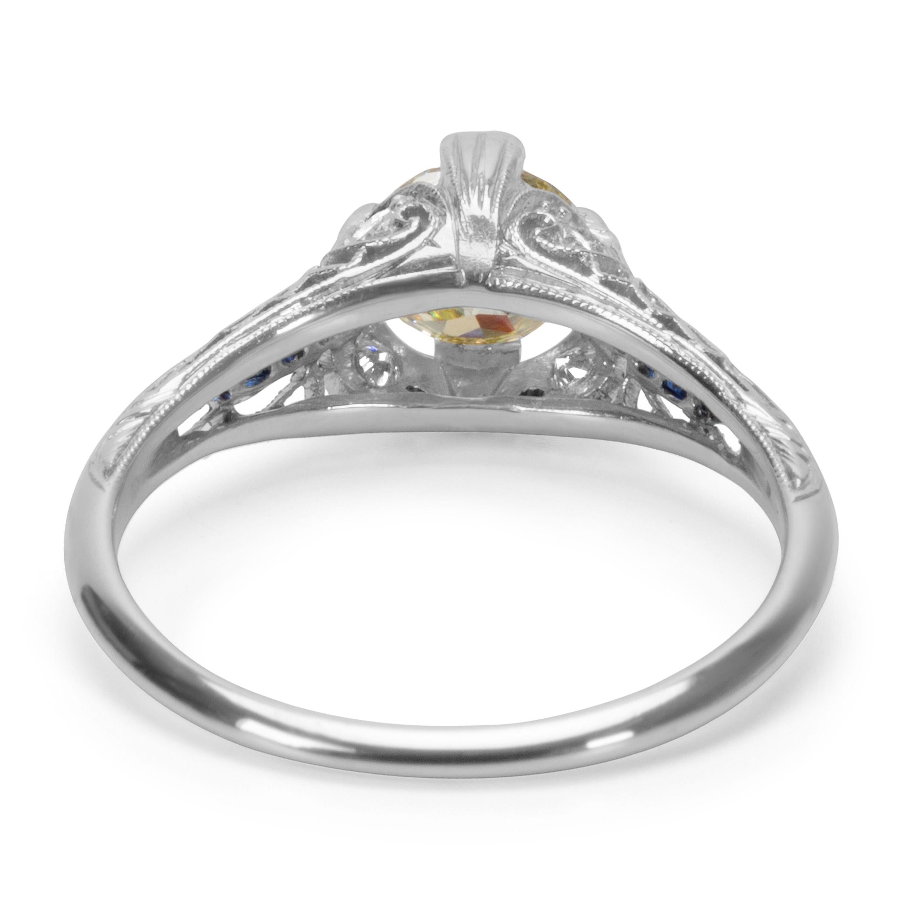 Recently polished to excellent condition. Comes with IGL certificate. Estimated retail value $9,995. 

Center Stone Type: Diamond
Center Stone Weight: 1.00 ctw
Center Stone Shape: Round
Center Stone Color: Fancy Yellow
Center Stone Clarity: VS2
Cert