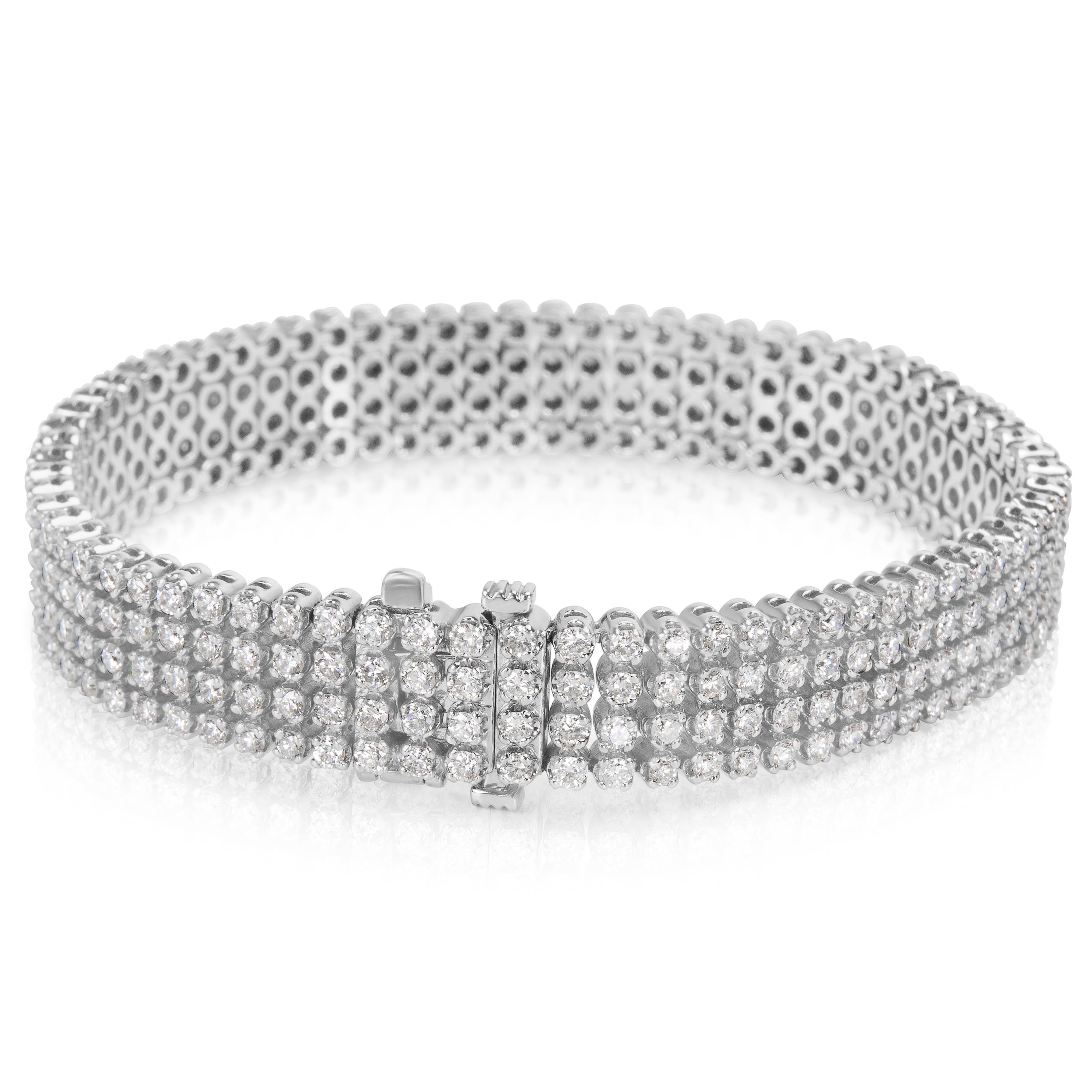 Est. retail price 12,425 USD. Brand new and unworn. Comes with IGL Certificate and presentation box. Bracelet length 7 inches.

Total diamond weight: 7.00 cts
Diamond shape: Round
Diamond color: F-G
Diamond clarity: VS
