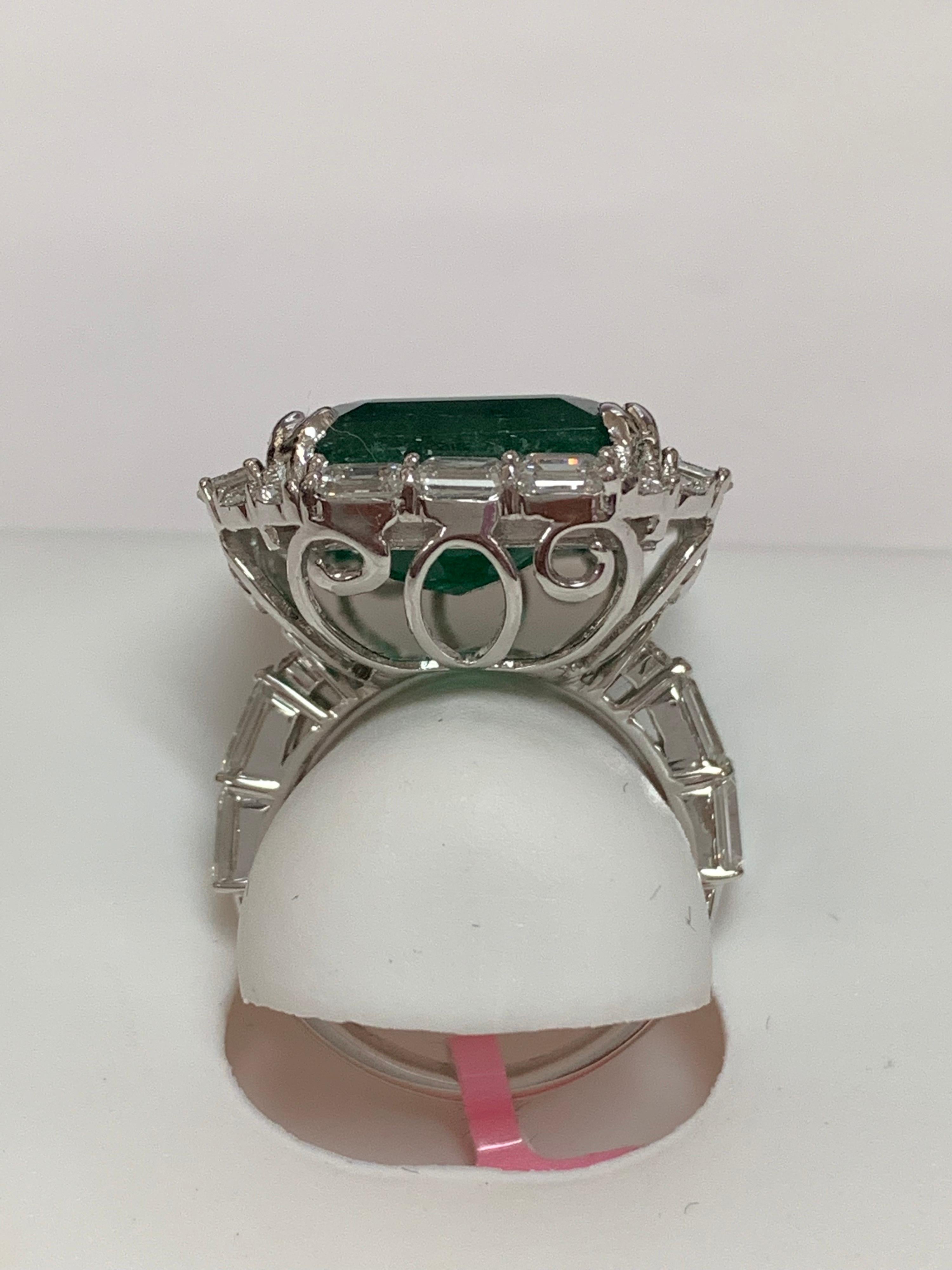 Emerald Cut IGLCertified 23.98 Carat Emerald and a Diamond Ring