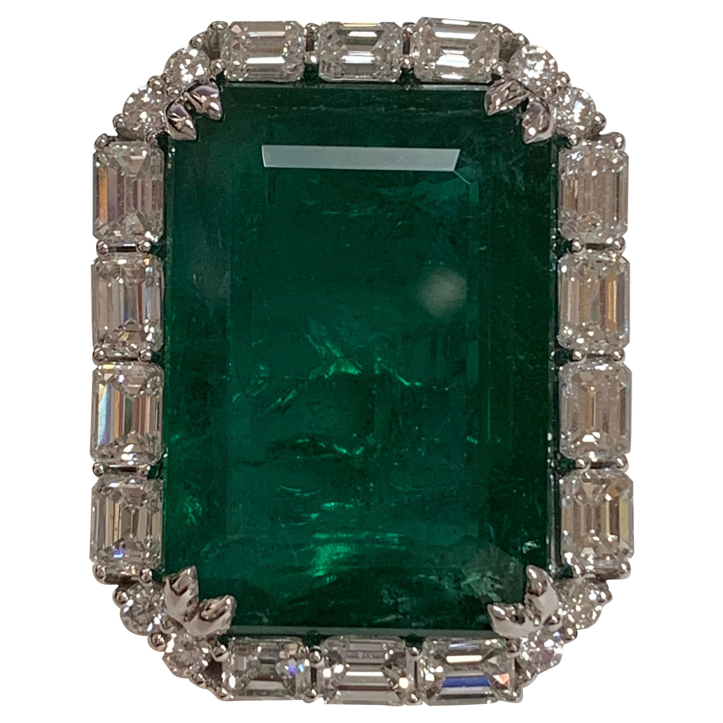 IGLCertified 23.98 Carat Emerald and a Diamond Ring