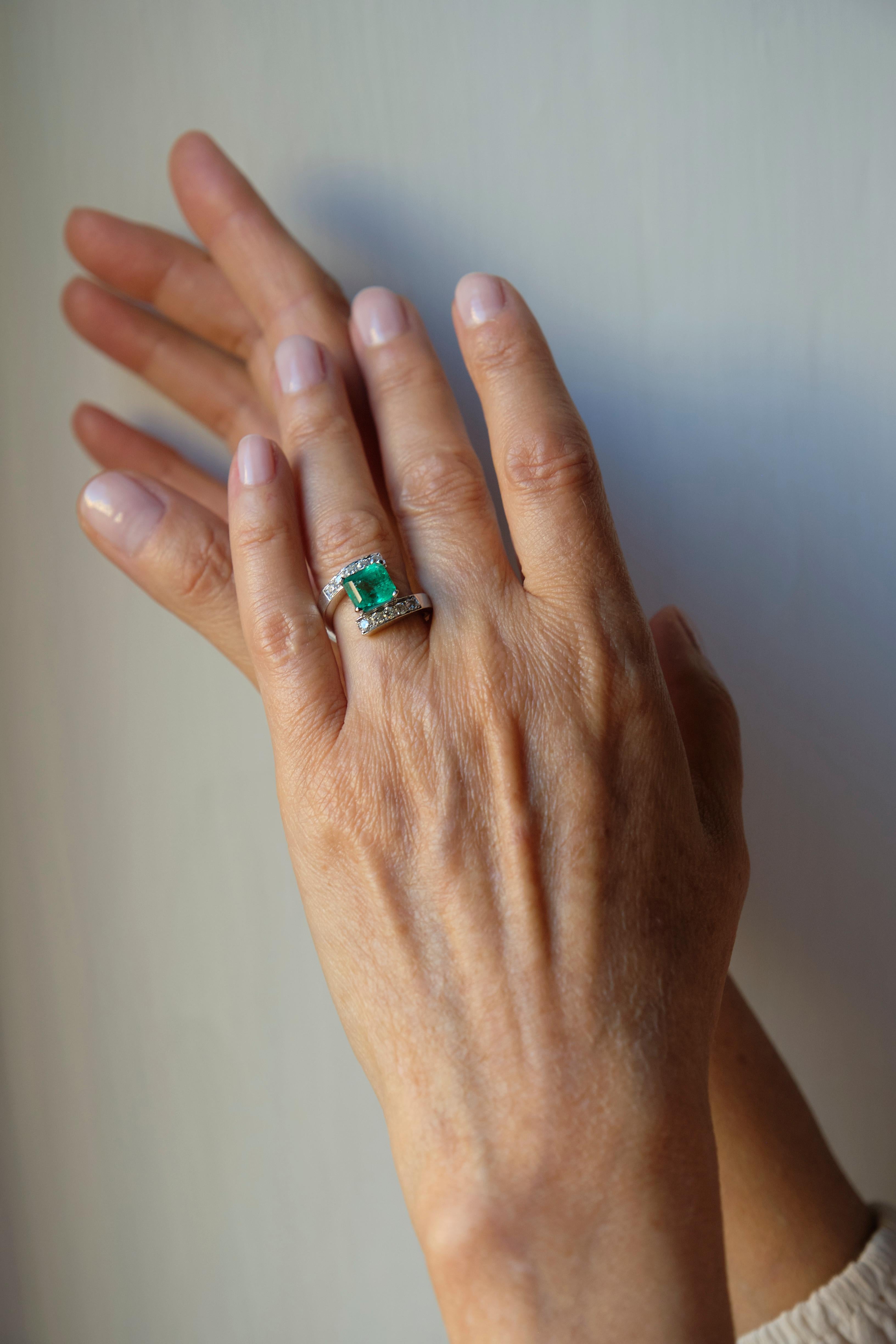 Elevate your style with the Rossella Ugolini Design Collection, featuring the IGN Certified 2.10 Carat Emerald 18Karat 0.56 Carat White Gold White Diamonds Cocktail Ring. This exquisite piece is a testament to craftsmanship, capturing the essence of