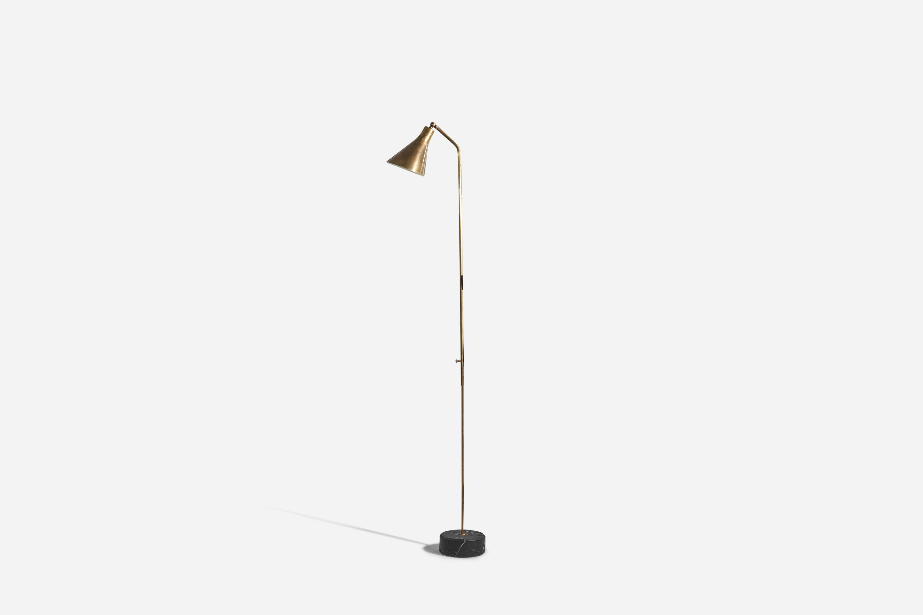 An early production, adjustable brass and black marble floor lamp, model 