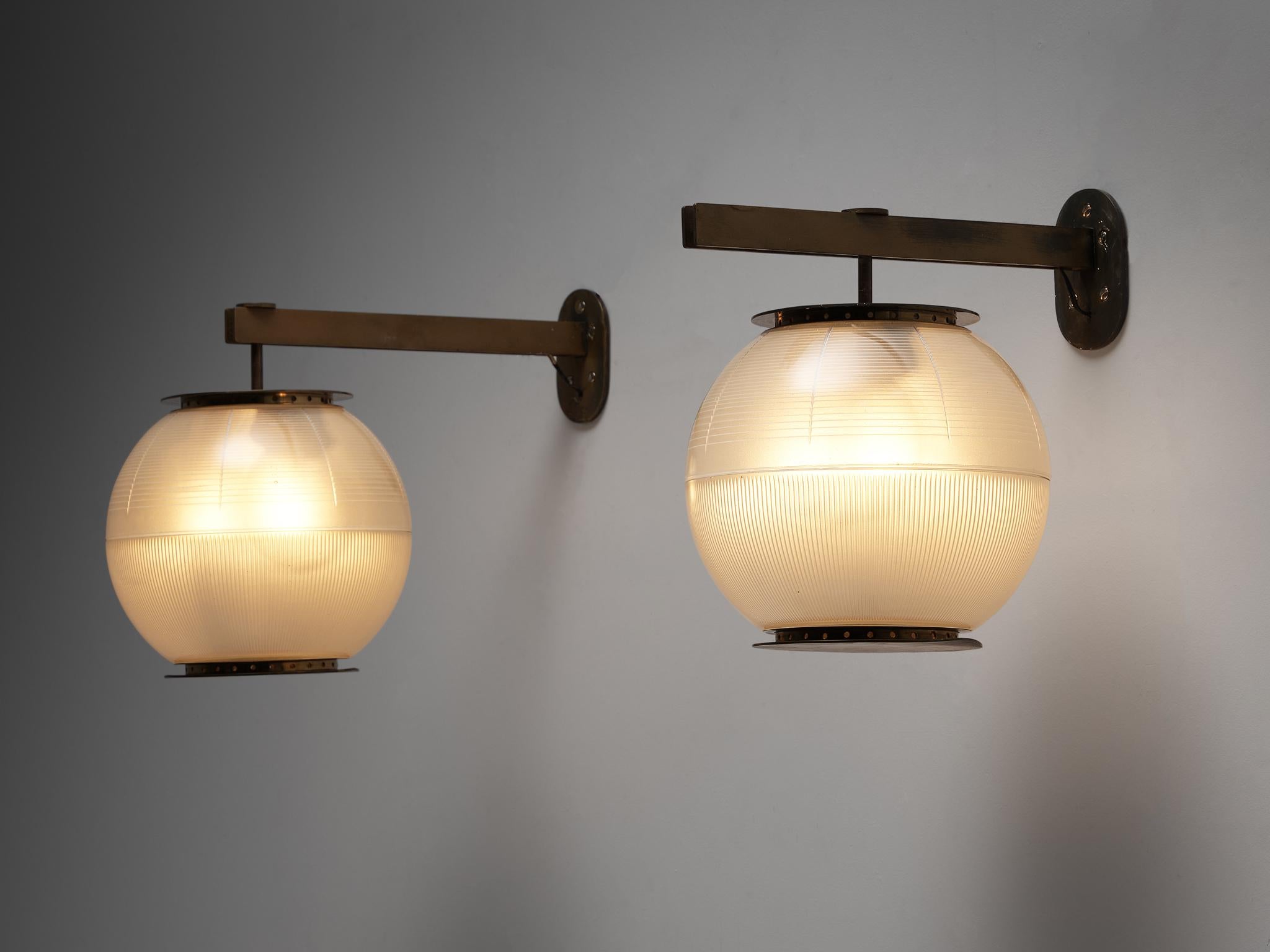 Ignazio Gardella for Azucena, wall sconces LP7, brass and glass, Italy, 1955

A set of wall lights by the designer and architect Ignazio Gardella. The glass spheres are adjustable by moving them closer or further from the wall. The brass stem has