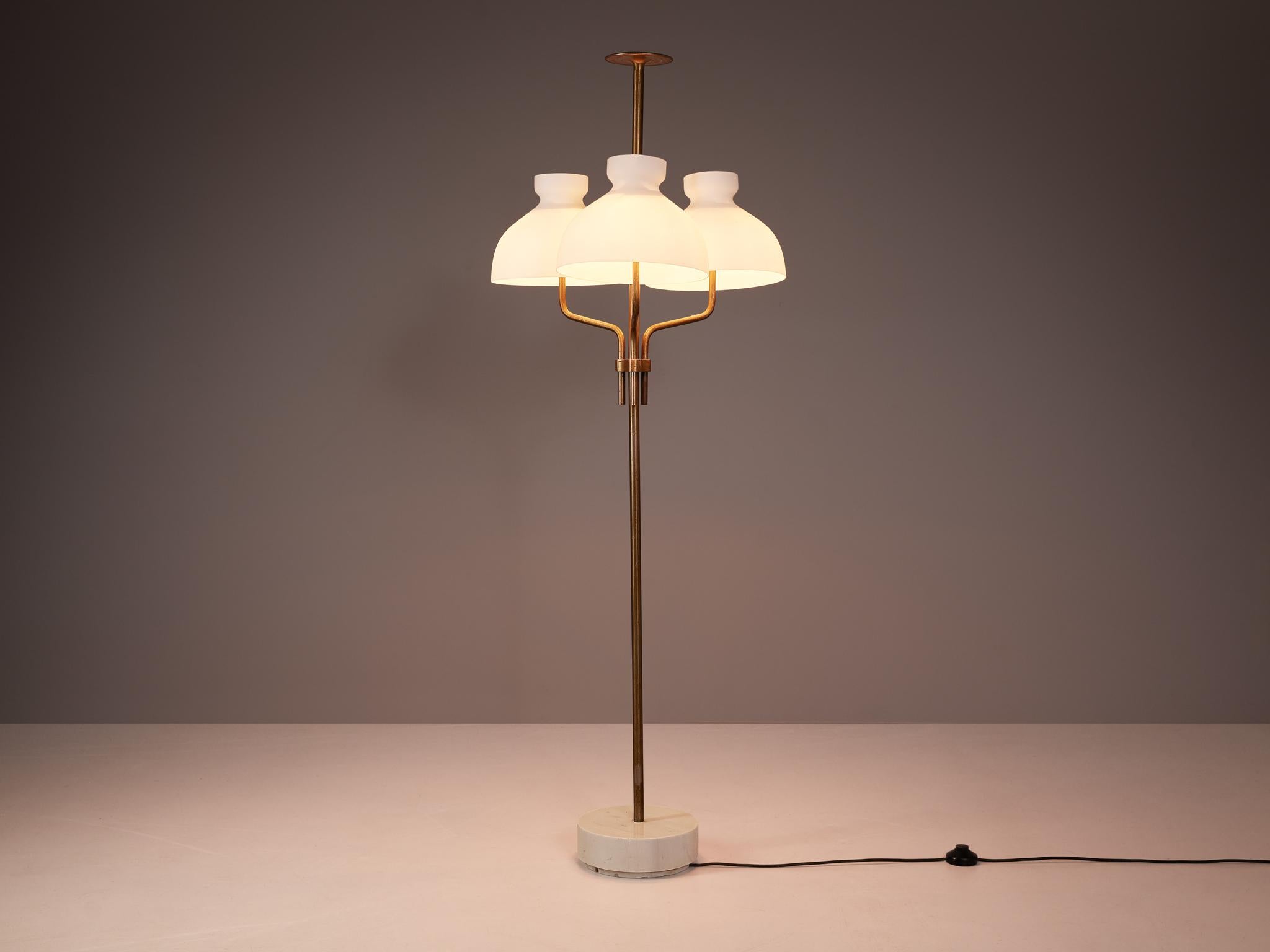 Ignazio Gardella for Azucena, floor lamp 'Arenzano', brass, Carrara marble, opaline glass, Italy, circa 1956

This delightful floor lamp is a design by Ignazio Gardella for Azucena around 1956.  Its graceful stem is crafted from three gracefully