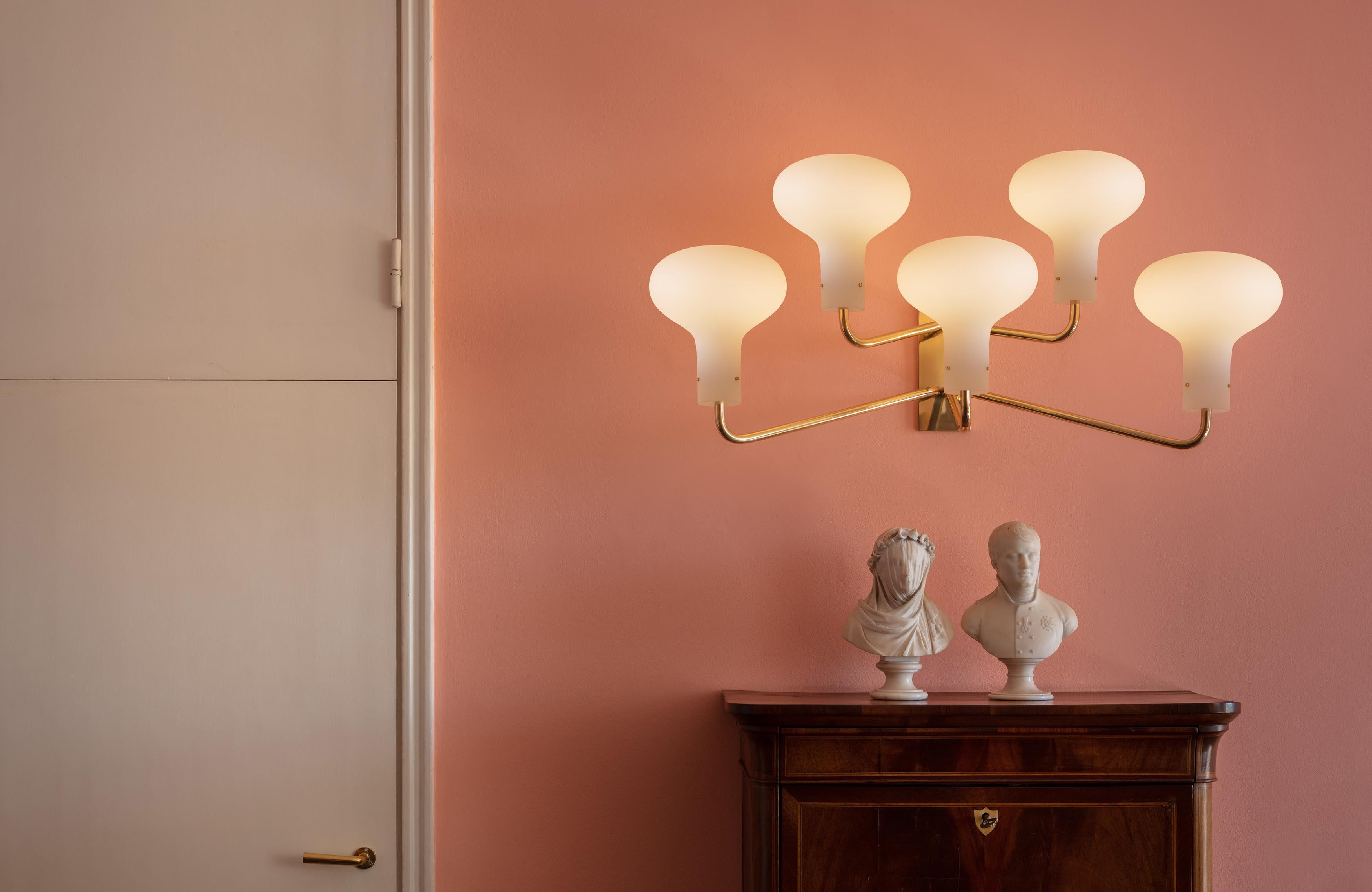 Ignazio Gardella 'Galleria' 5-Arm Wall Lamp for Tato Italia in Brass and Glass. Executed in blown opaline glass and polished brass.

Gardella's designs were often born from a specific need in an architectural project, and 'Galleria' is no different.