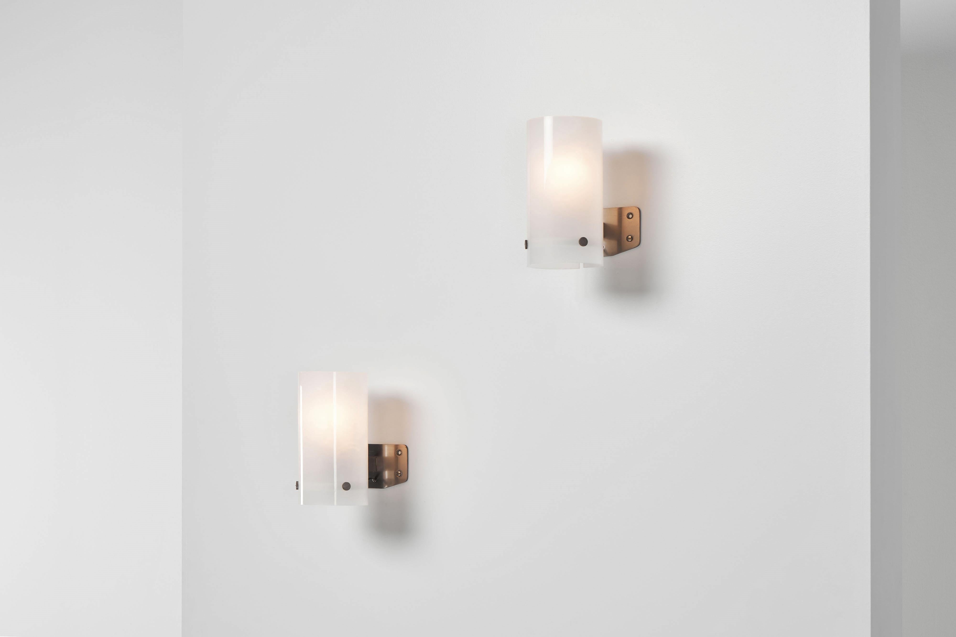Exquisite LP8 sconces wall lamps by Ignazio Gardella designed in 1955 for Azucena Italy, an esteemed Italian brand. Azucena was one of the leading luxury furniture, accessories and light producers from the mid 20th century. These sconces showcase