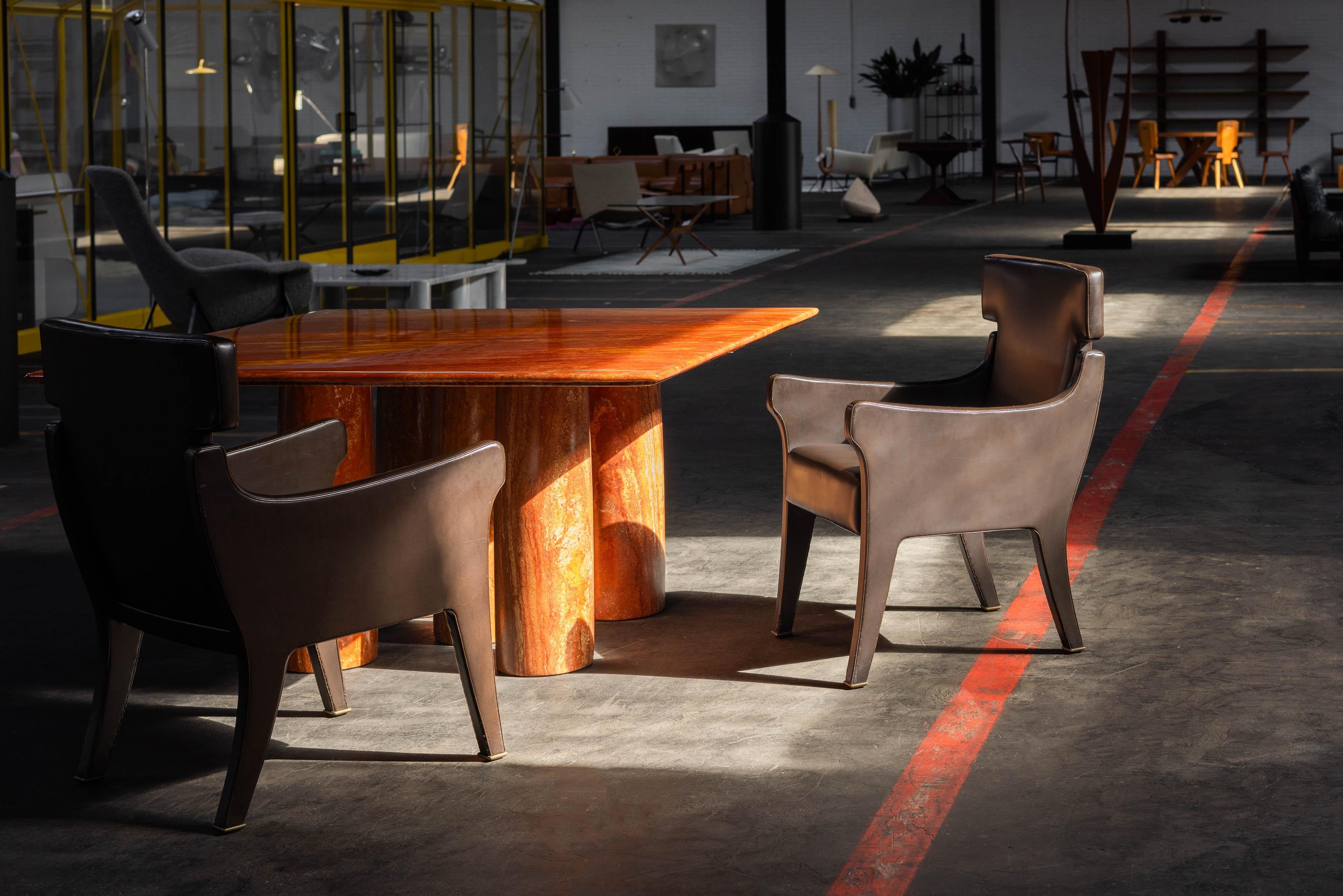 These 10 rare model P10 fully upholstered armchairs are an elegant and decorative design by Ignazio Gardella, one of the masters of 20th-century Italian design. Upholstered in original chocolate brown leatherette—a synthetic vinyl leather typical of