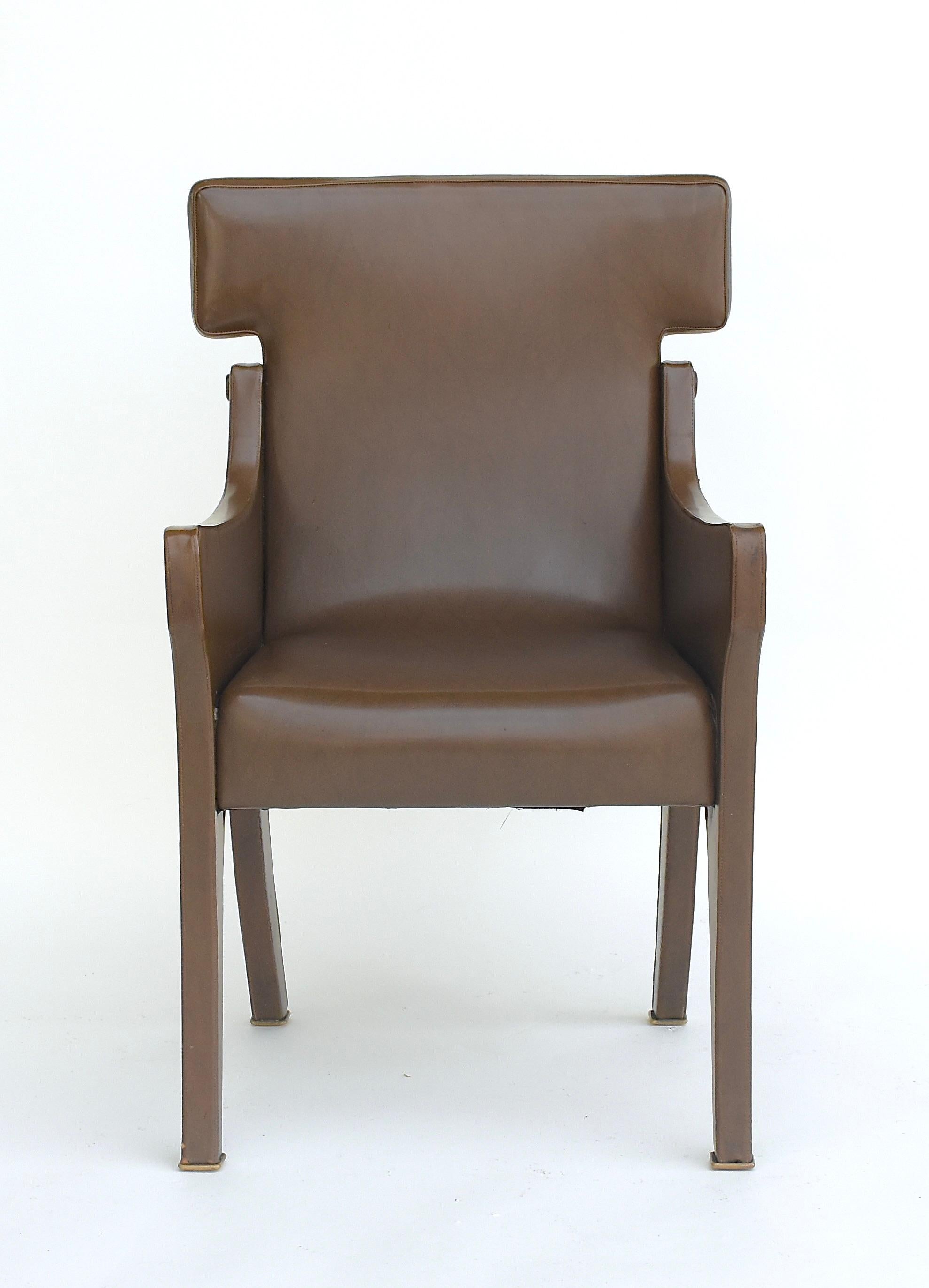 A hard to find original Ignazio Gardella R63 Armchair for Azucena in Olive Brown synthetic vinyl leather that was used at the times by many furniture designers. The chair maintains the original upholstery from 1963.
A great hard to find chair with