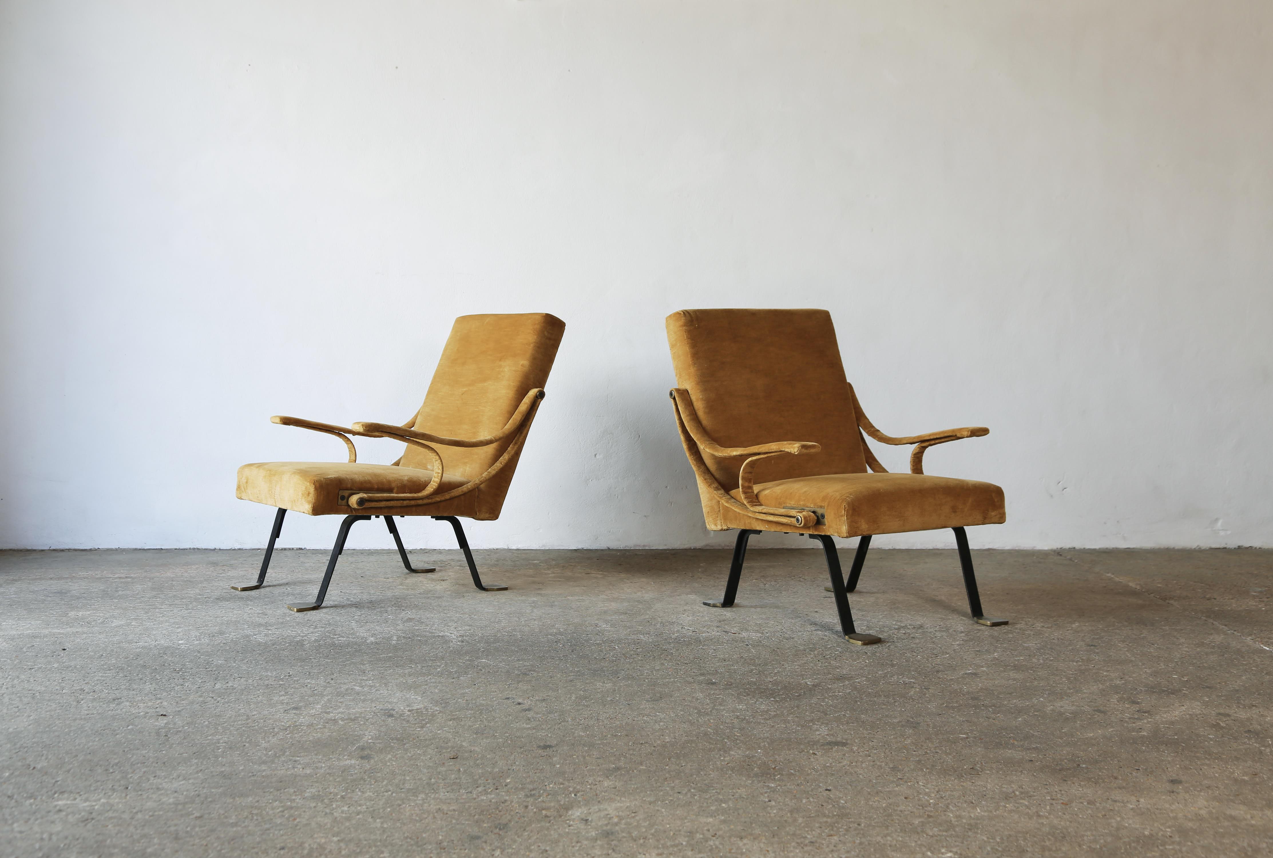An original, early pair of Ignazio Gardella Reclining Digamma chairs, designed in the late 1950s and produced by Gavina, Italy in the 1960s. Newly reupholstered in yellow / gold velvet.  The metal frames are in good original condition with nicely