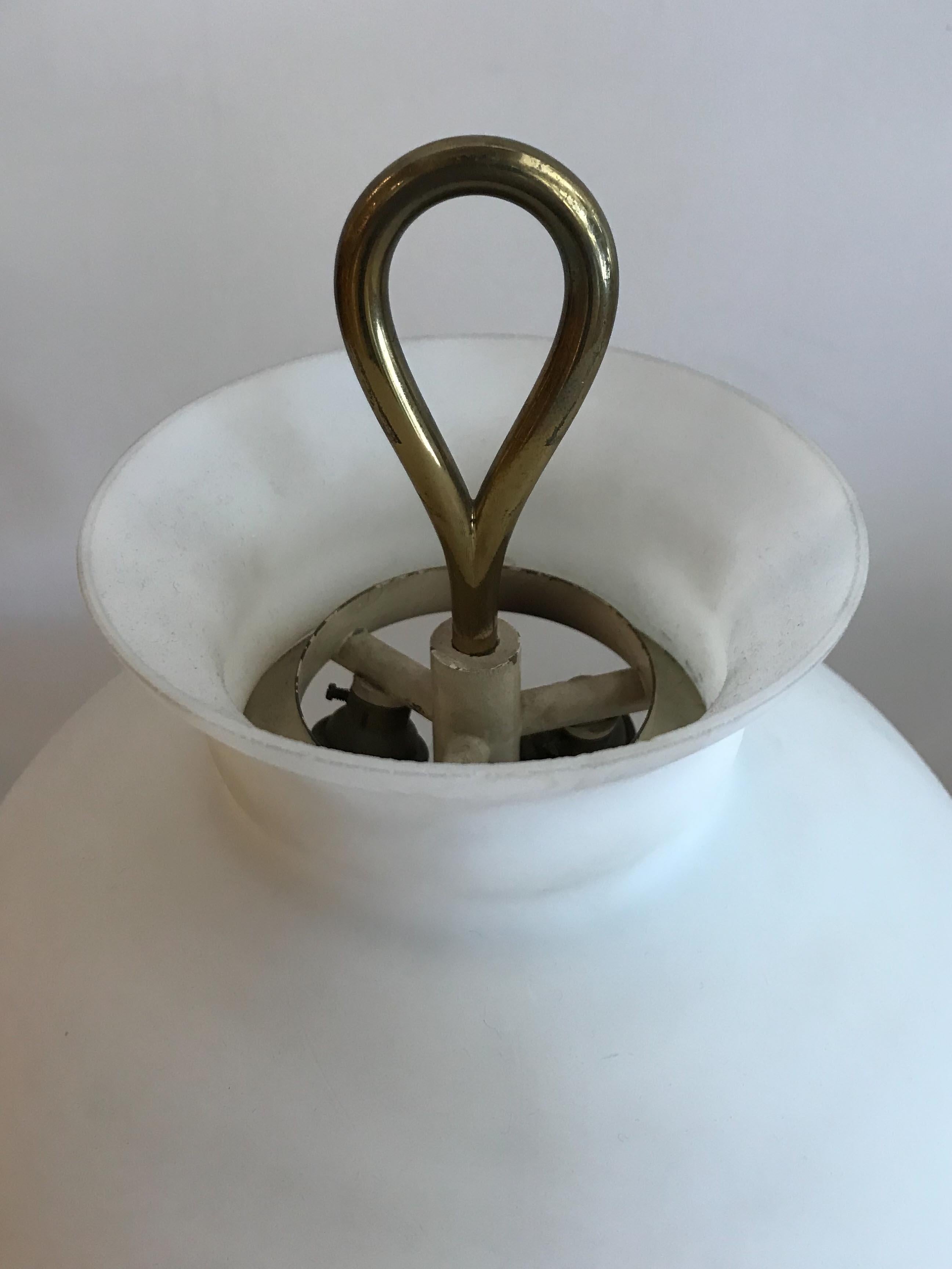 Italian table lamp model Arenzano designed by Ignazio Gardella for Azucena in 1956. Good vintage condition with normal patina in the brass body, minor wear to glass, portion of porcelain socket missing, please see photos. Original European spec.