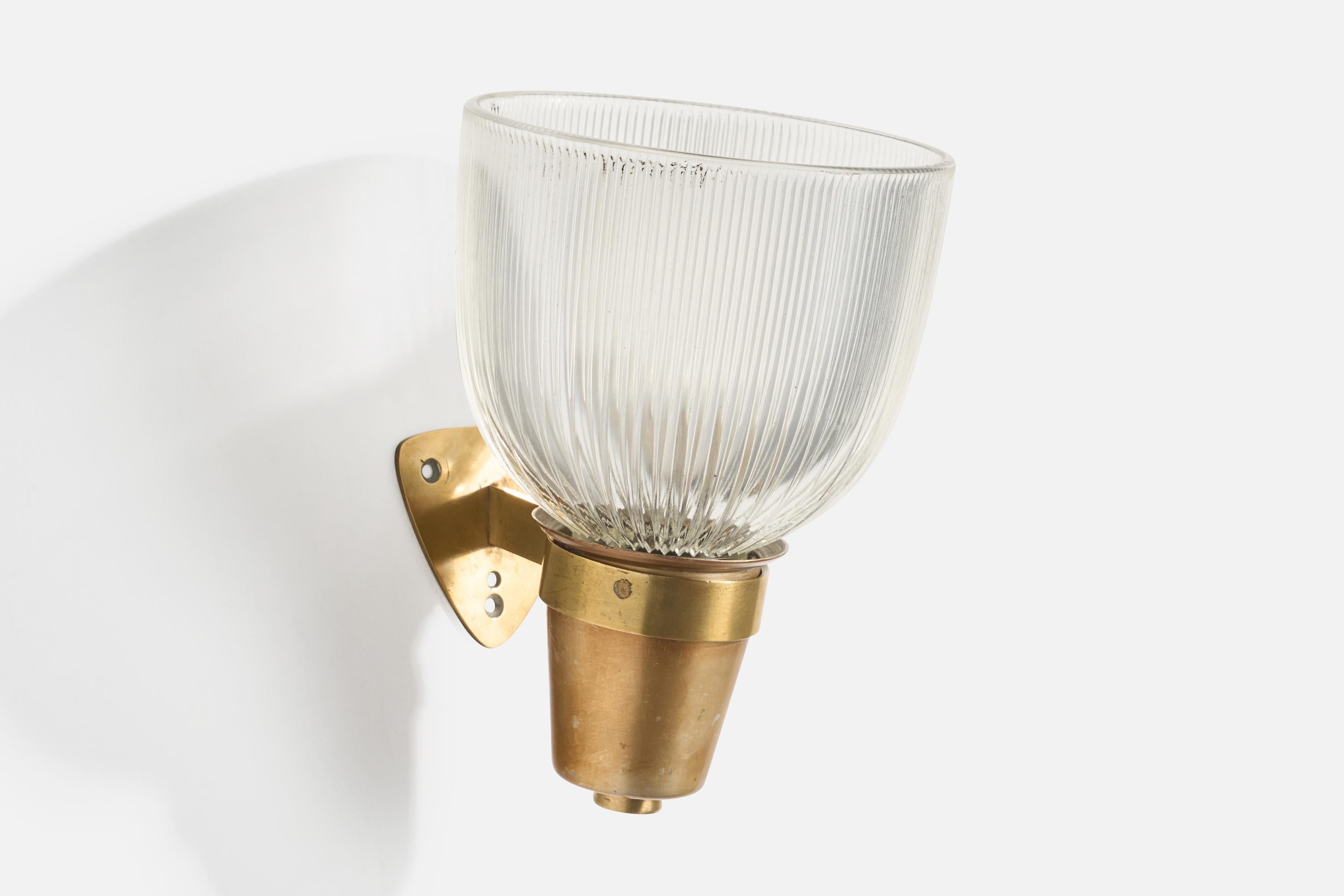 A brass and glass wall light designed by Ignazio Gardella and produced by Azucena, Italy, 1960s.

Overall Dimensions (Inches): 9.4” H x 6.4” W x 7.4“ D

Back Plate Dimensions (Inches): 3” H x 3.25“ W x .1” D

Bulb Specifications: E-26

Number of