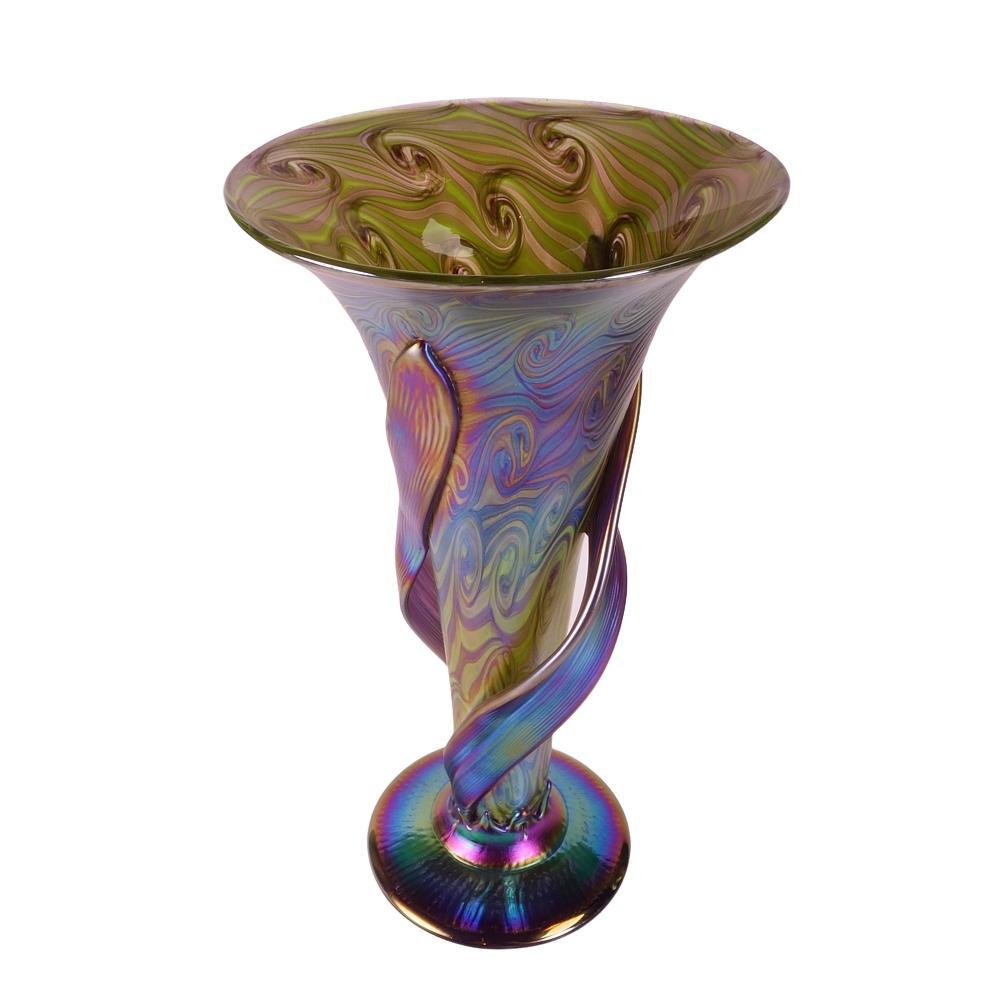 Presenting this monumental, Igor Muller art glass vase. Vase is decorated with iridescent green “swirl” designs on a round applied foot and accented by two large peacock blue large leaf designs. This vase is in excellent condition with no chips,