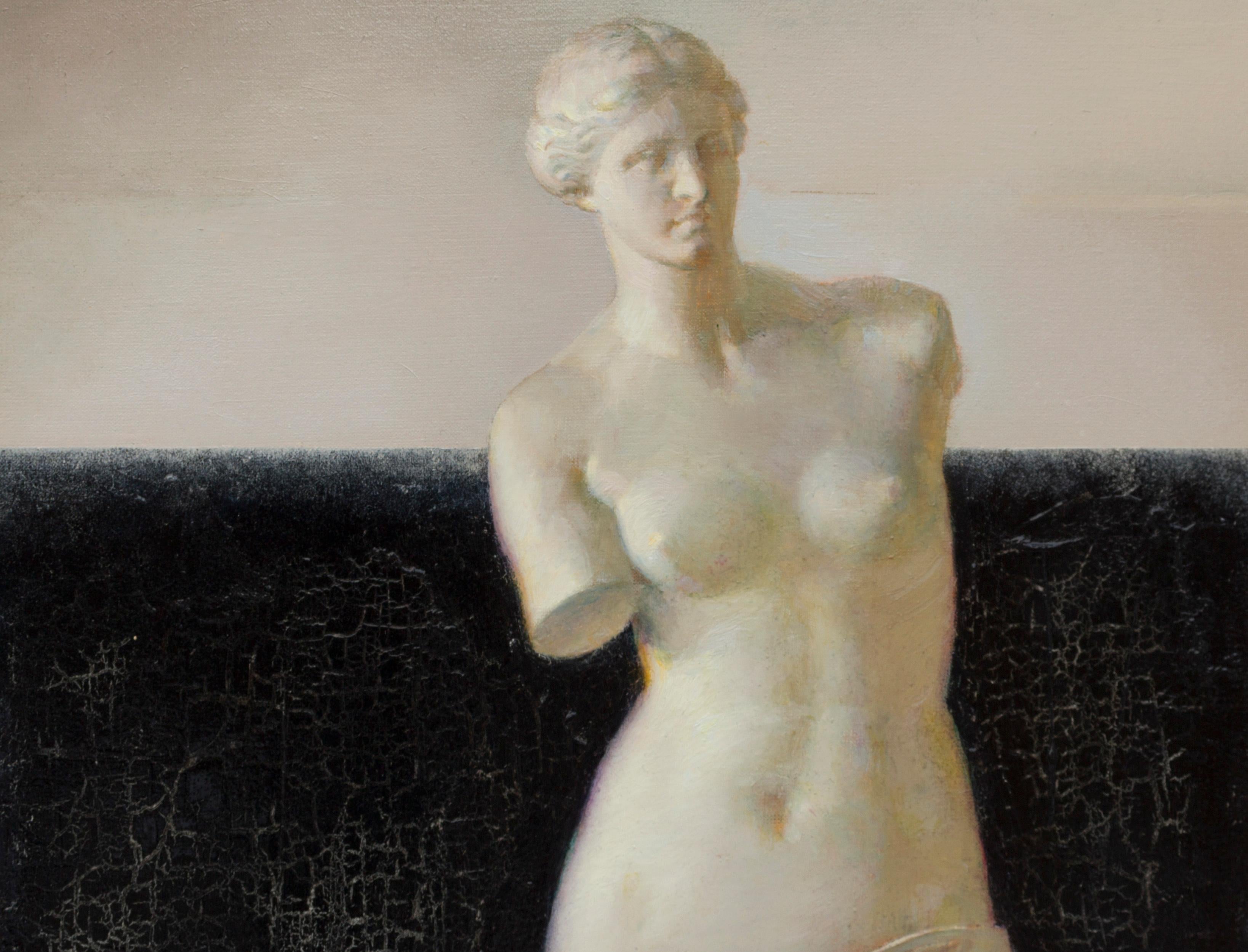 The painting features two pieces of art. The difference between their creation is about 2000 years. The first is the sculpture, Venus de Milo, the most famous of all ancient Venuses. One of the peaks of ancient Greek art. The second work is a