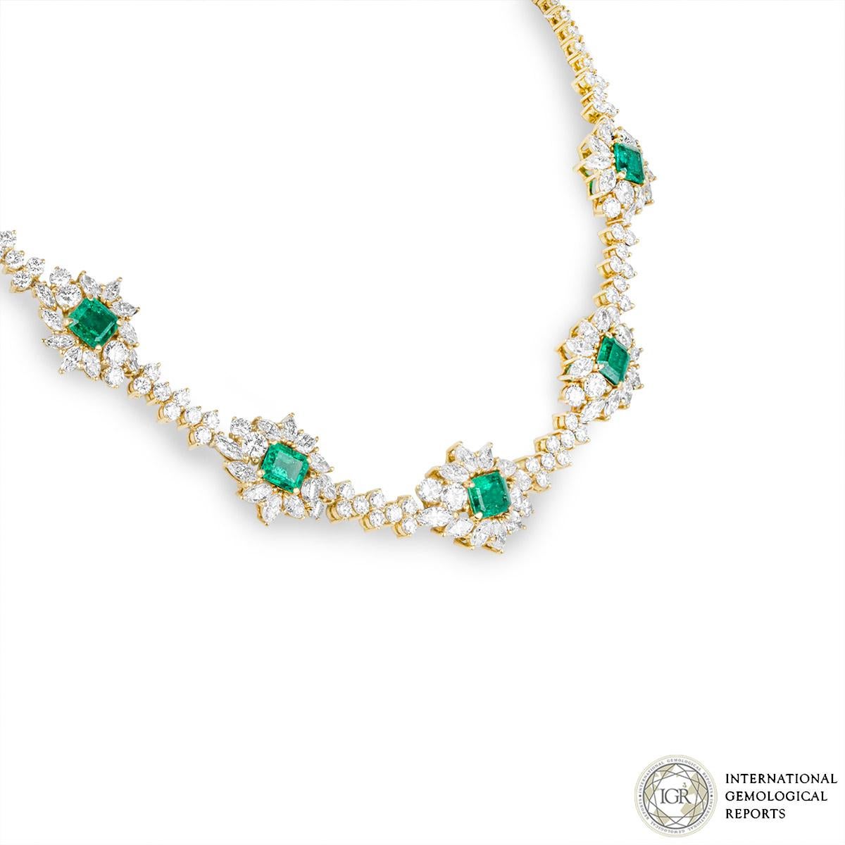 A stunning emerald and diamond necklace in 18k yellow gold. The main body of the necklace features 5 square mixed cut natural emeralds of Columbian origin. The emeralds have a total weight of approximately 5.04ct and display a strong green colour.