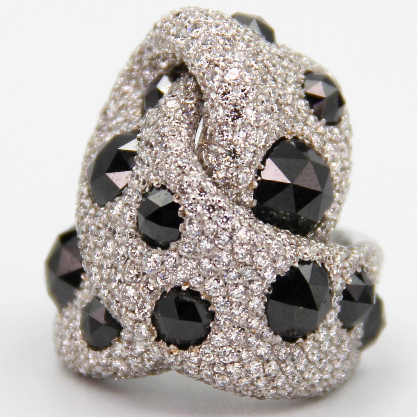 This Italian Brand named Palmiero is stareted manufacturing in 1970's . The ring is perfectly designed with natural Black and White diamonds approx. total of 13.41 Carats on white gold .