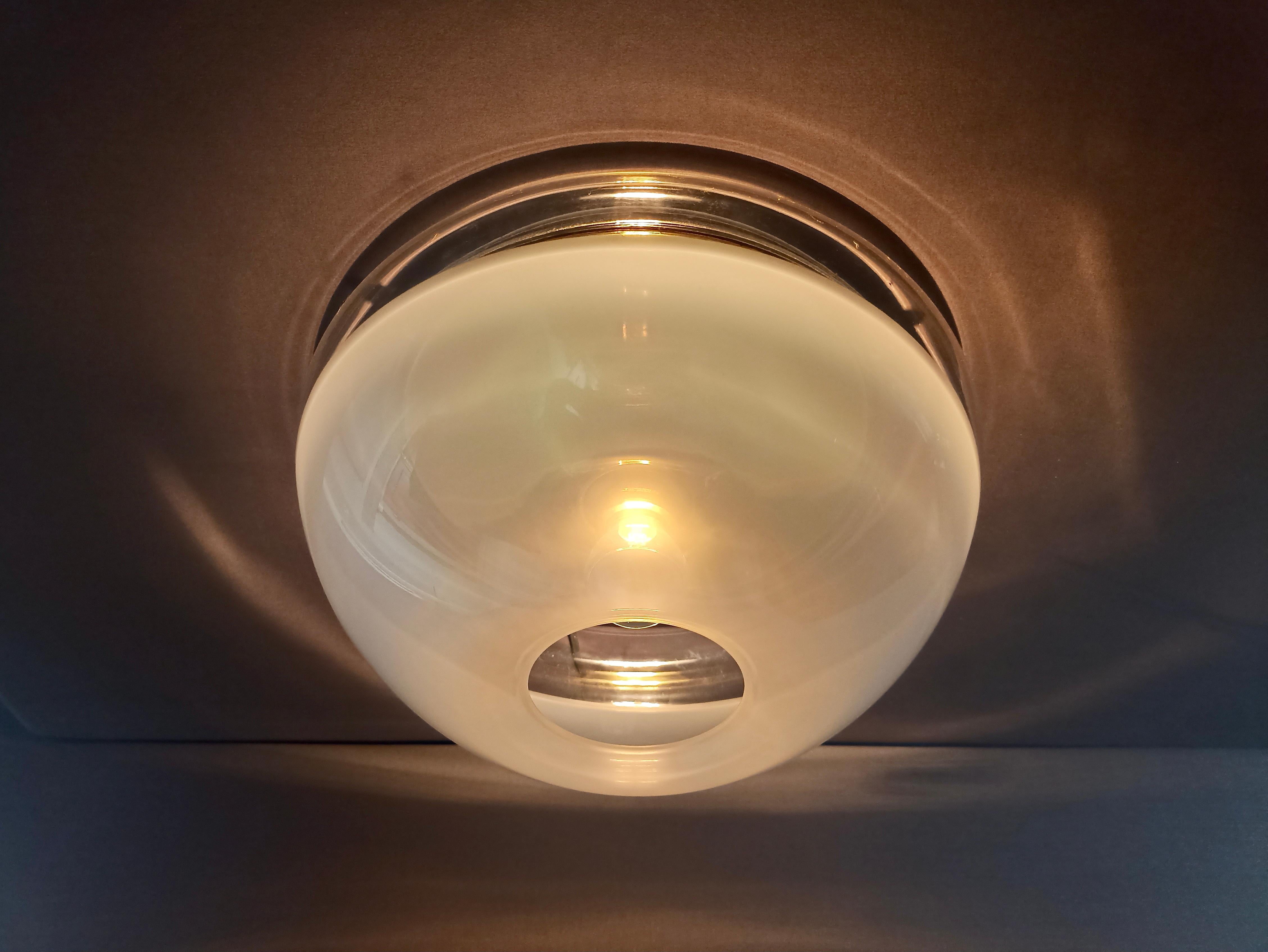 iGuzzini 1970s rare and original plastic and brass ceiling lamp.  In Good Condition For Sale In Caprino Veronese, VR