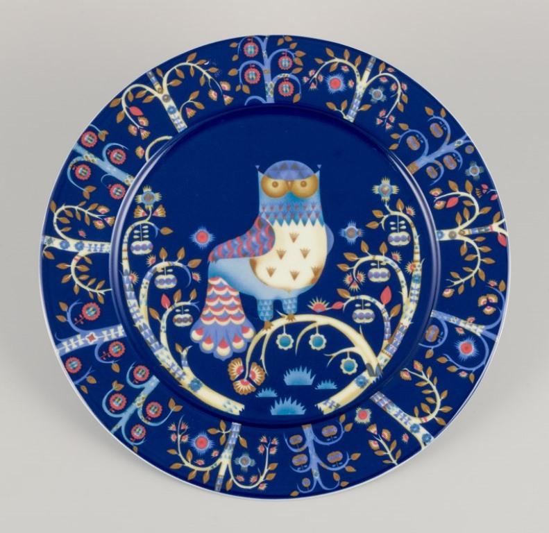 Iittala, Finland. 
Two large dinner plates/serving plates in porcelain with an owl motif on a branch.
From the 