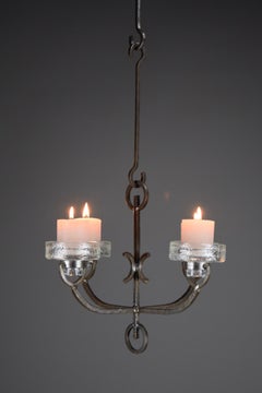 Portacandele da soffitto in ferro battuto e vetro di Iittala, un'azienda moderna del Medioevo