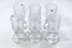 Iittala "Sennattori" Wine Glasses and "Festivo" Candlesticks