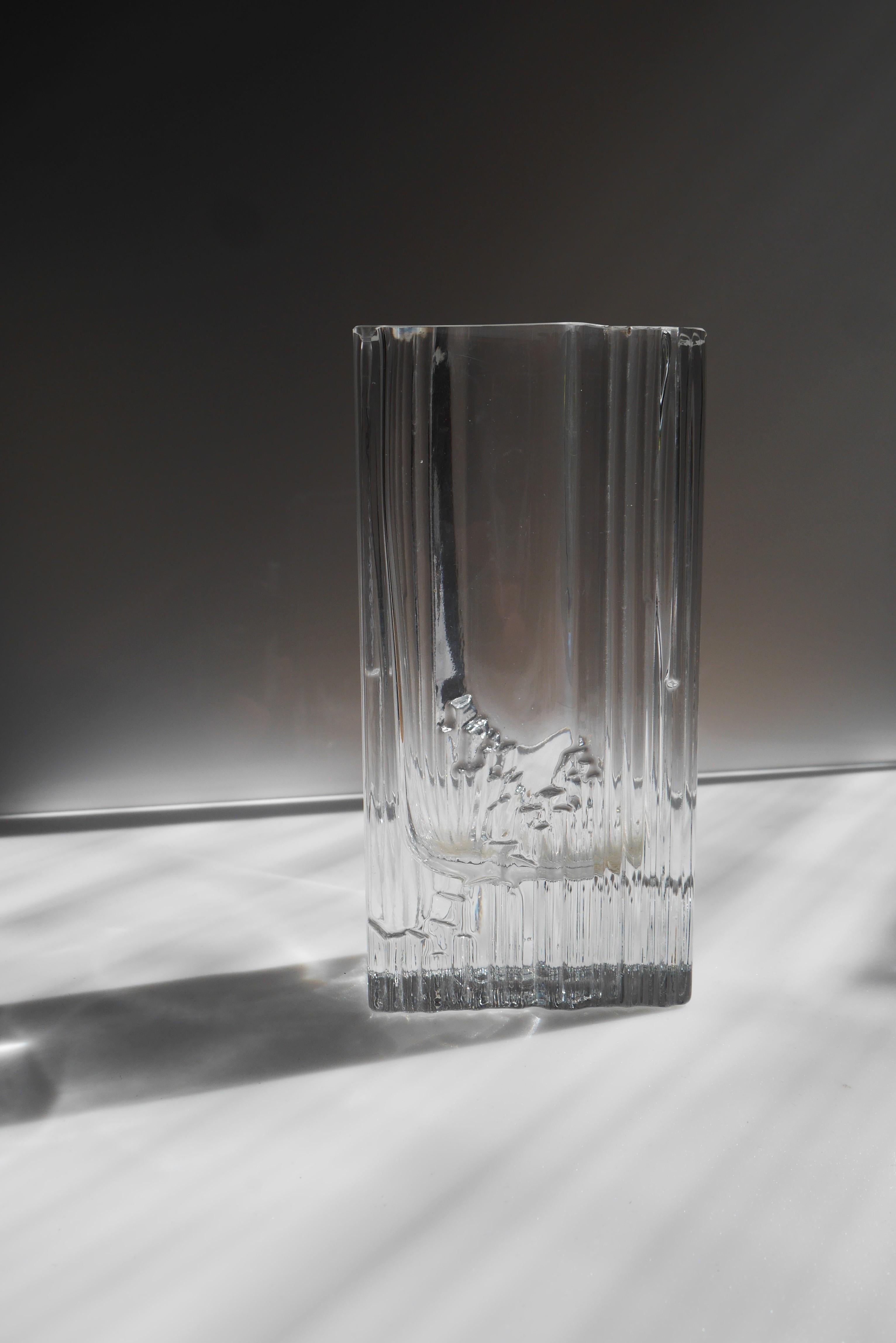 A mid-century modern glass vase made and signed by talented Tapio Wirkkala known as “Sointu”, Iittala. The name of the vase translates to 