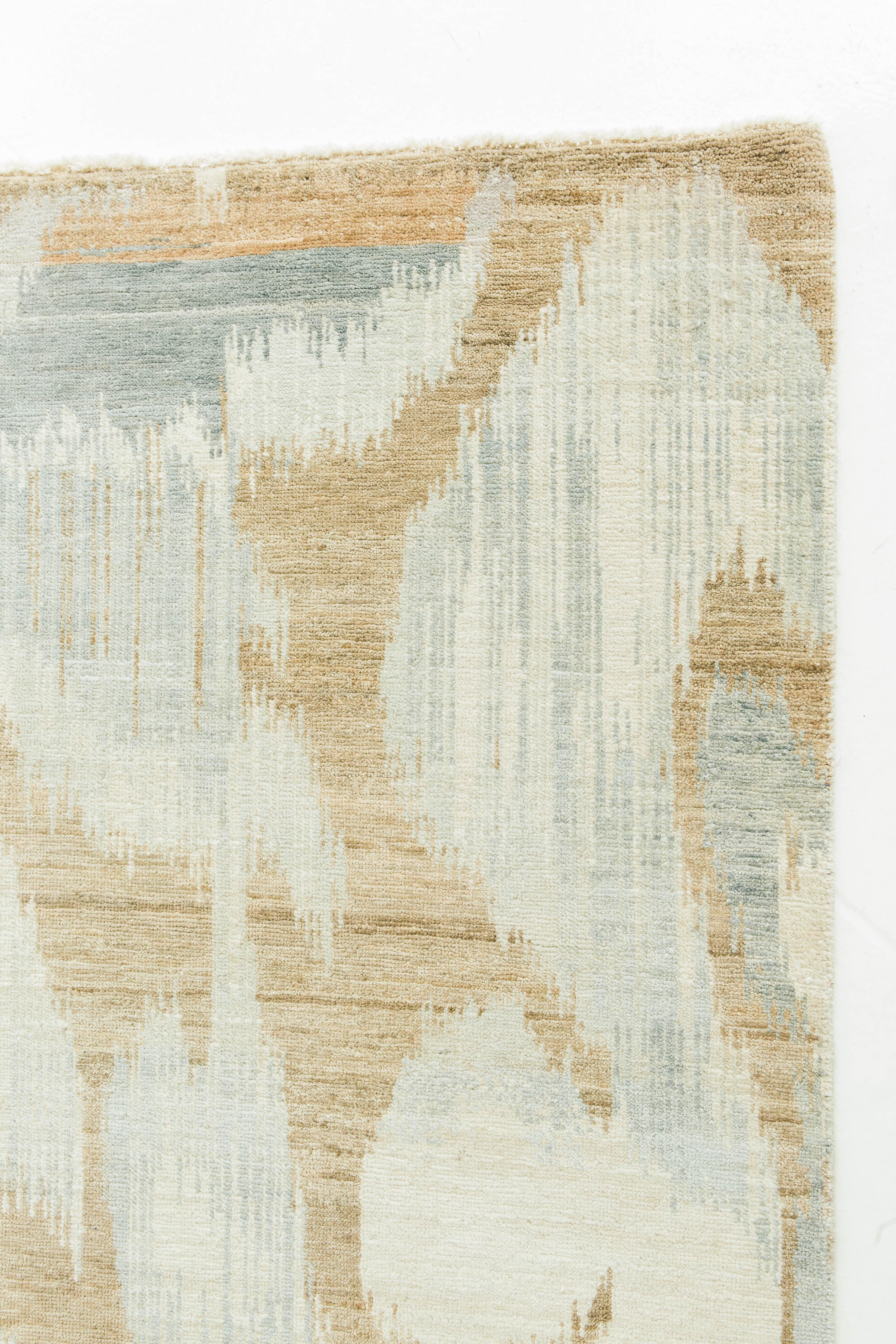 'Berja' is a beautiful magnified Ikat design rug in ivory, golden-taupe, and gray blues. The colors work cohesively to bring about a calm yet invigorating design. Ikat designs are globally inspired for today's modern design world.


Rug Number