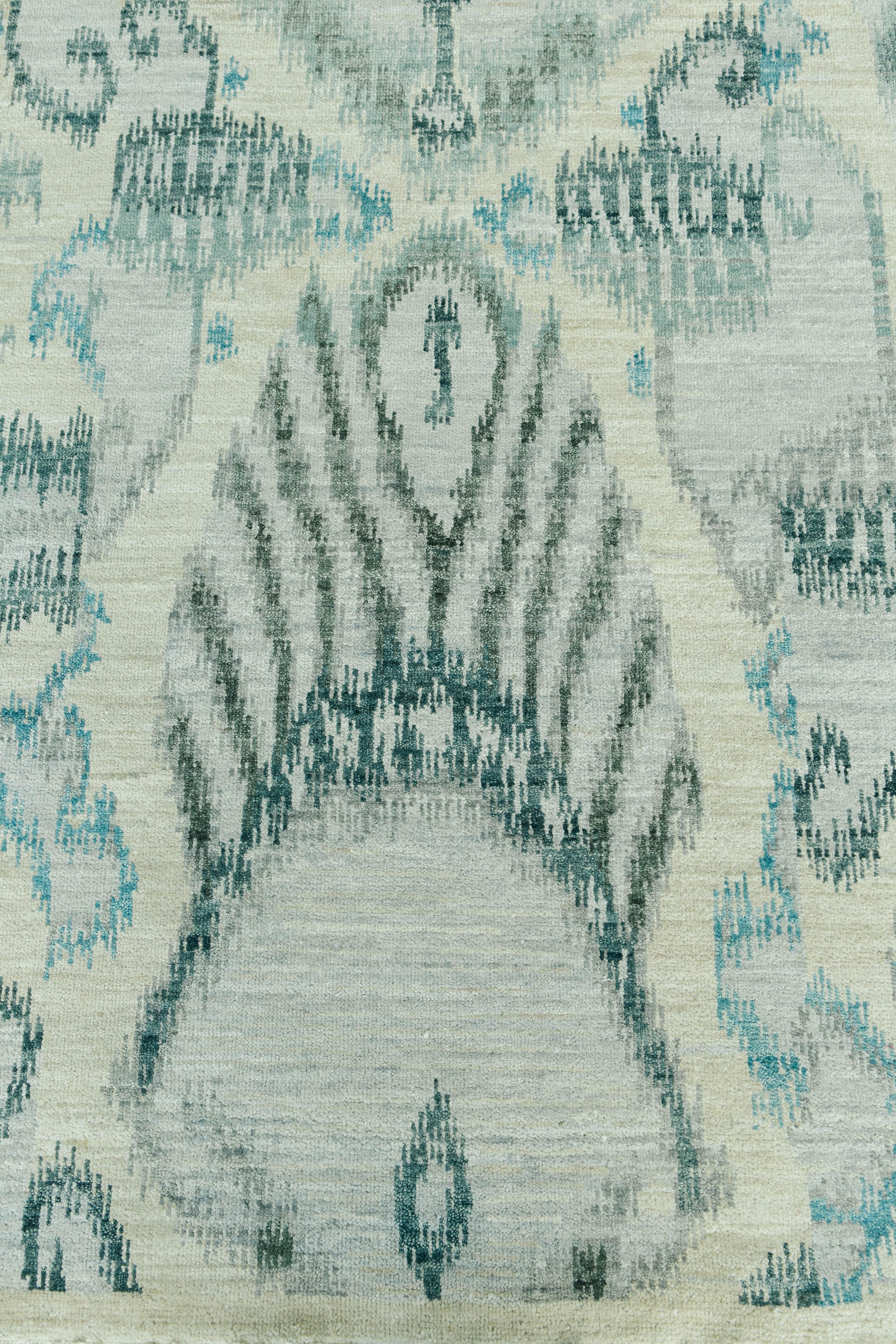 'Camzol' is beautiful blue and ivory Ikat design. Its playful design will bring excitement to any space while its calming hues of blue create an uplifting essence. Ikat designs have been globally inspired for today's modern design world.

Rug