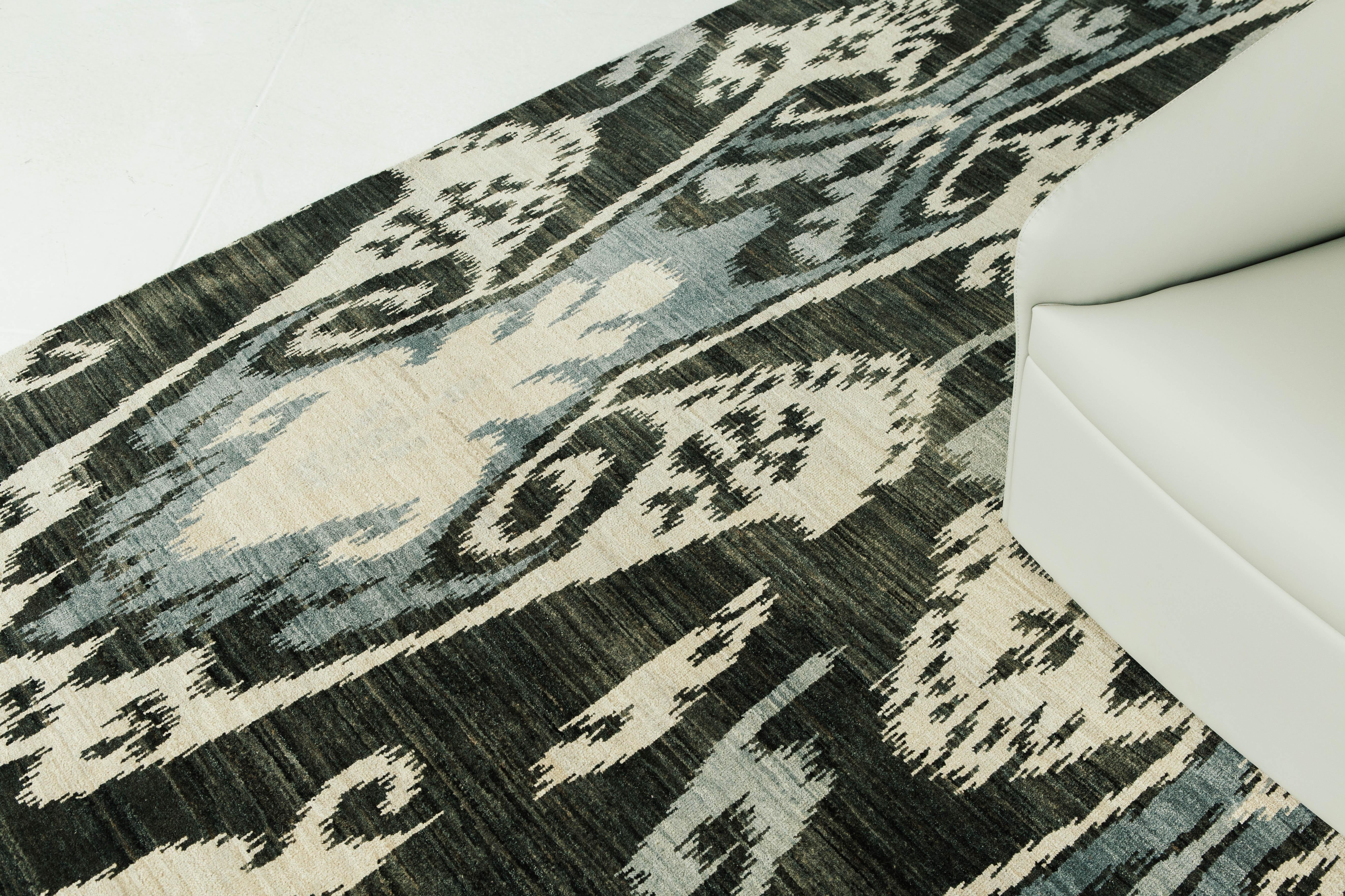 'Shahi' is a luxurious Ikat pile weave in black, ivory, and various hues of blue. Its playfully bold design will elevate any design space and leave lasting impressions. Ikat designs have been globally inspired for today's modern design