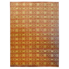 Tapis Ikat. Design orange, vert et rouge. 3,00 x 4,25 m