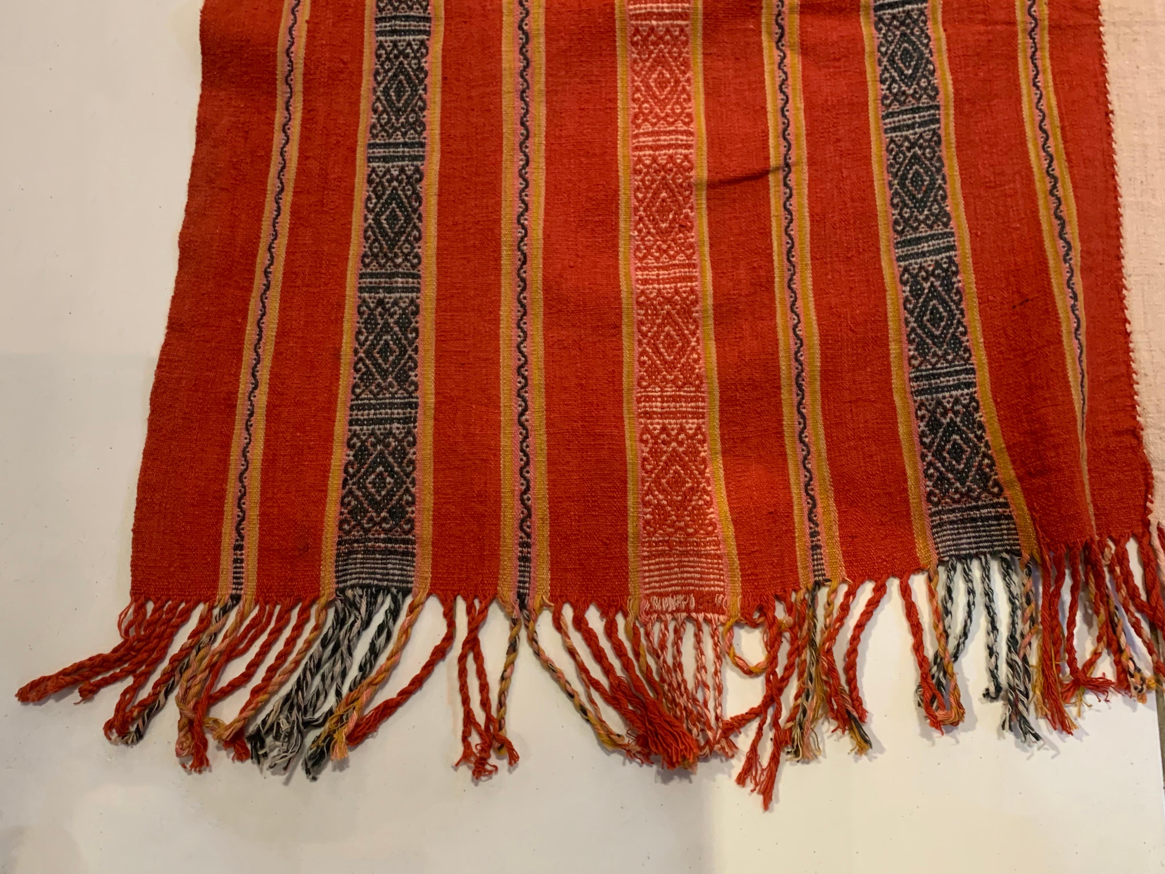 A wonderful example of a west timor ikat textile. It is hand-woven using naturally dyed yarns via a method passed on through generations. It features a stunning array of distinct tribal patterns and bright colours. Textiles such as this one are