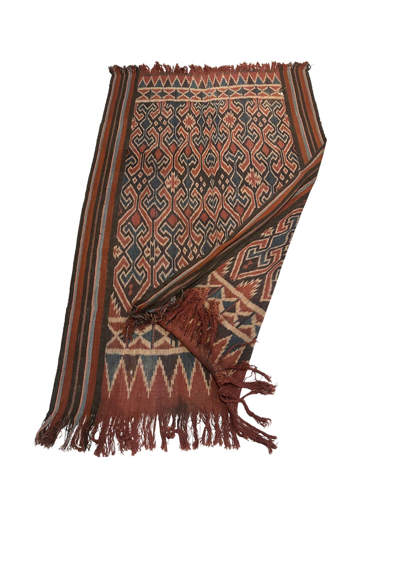 A very large Irate Textile from the Toraja tribes of Sulawesi, Indonesia. The Toraja tribes people are an ethnic and cultural group of people who occupy the mountainous highlands of South Sulawesi, Indonesia. Famous for their unique architecture and