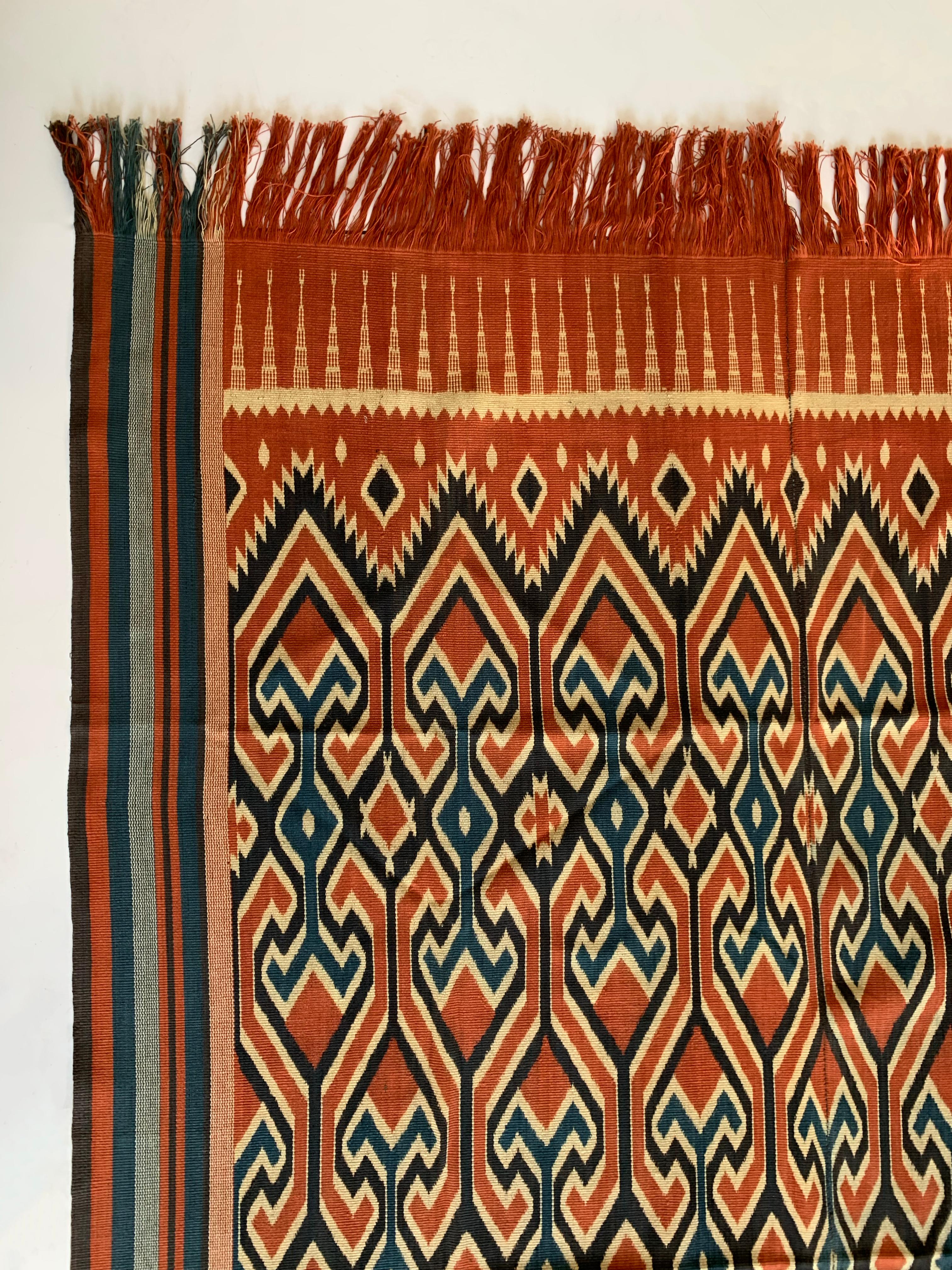 A very large Irate Textile from the Toraja tribes of Sulawesi, Indonesia. The Toraja tribes people are an ethnic and cultural group of people who occupy the mountainous highlands of South Sulawesi, Indonesia. Famous for their unique architecture and