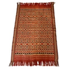Textile Ikat de la tribu Toraja de  Indonésie avec d
étonnants motifs tribaux