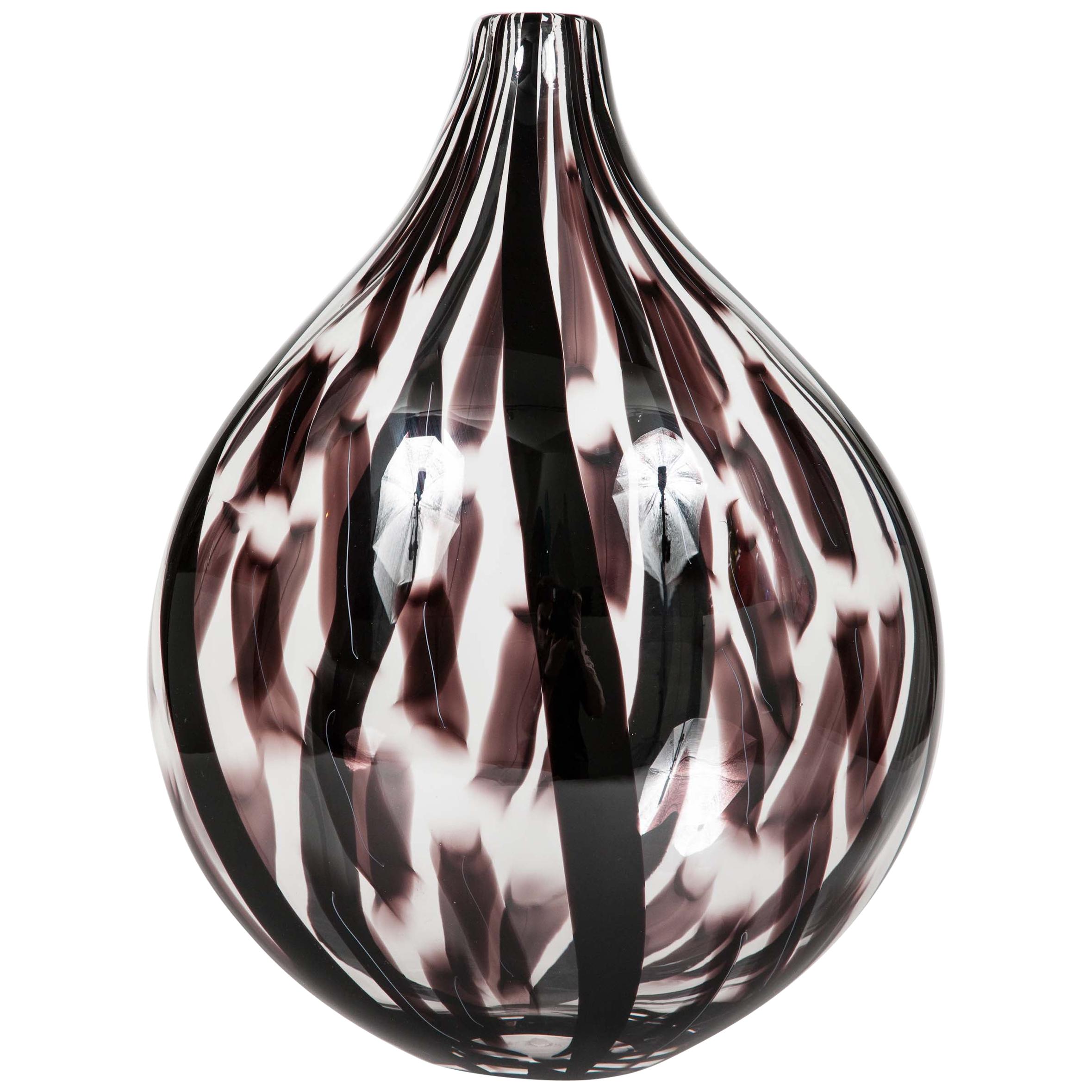 Ikate II, a clear & aubergine / black Glass blown Sculpture by Ann Wåhlström